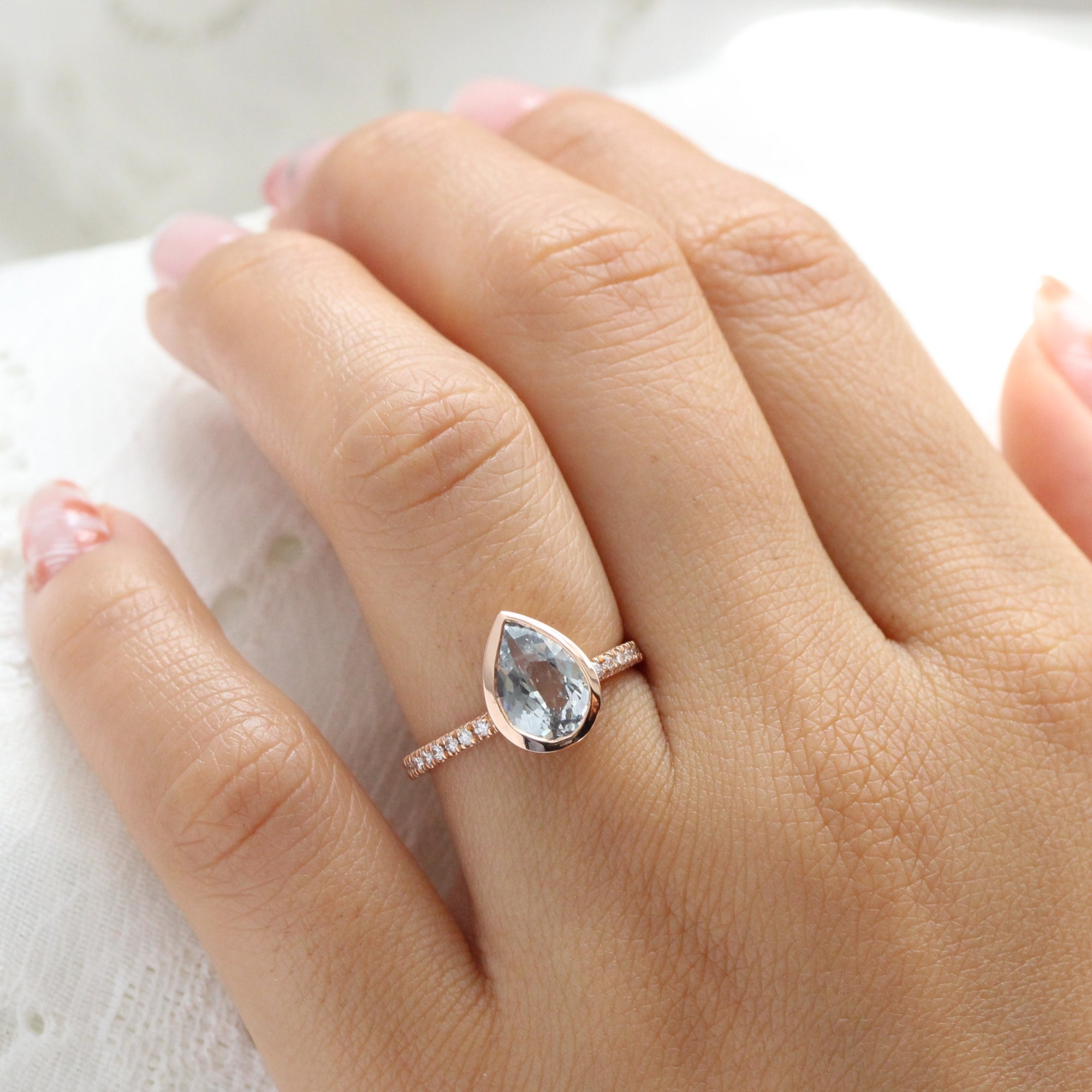 Pear aqua blue sapphire ring rose gold bezel solitaire pave diamond band la more design jewelry
