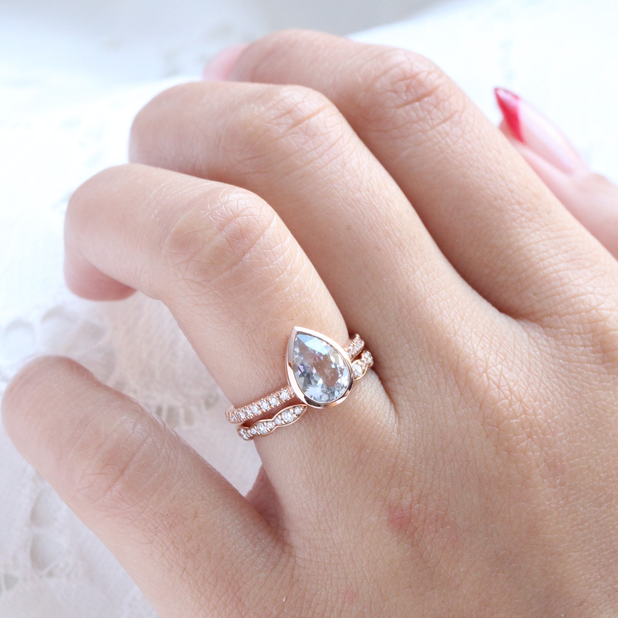 Pear aqua blue sapphire ring rose gold bezel solitaire pave diamond band la more design jewelry