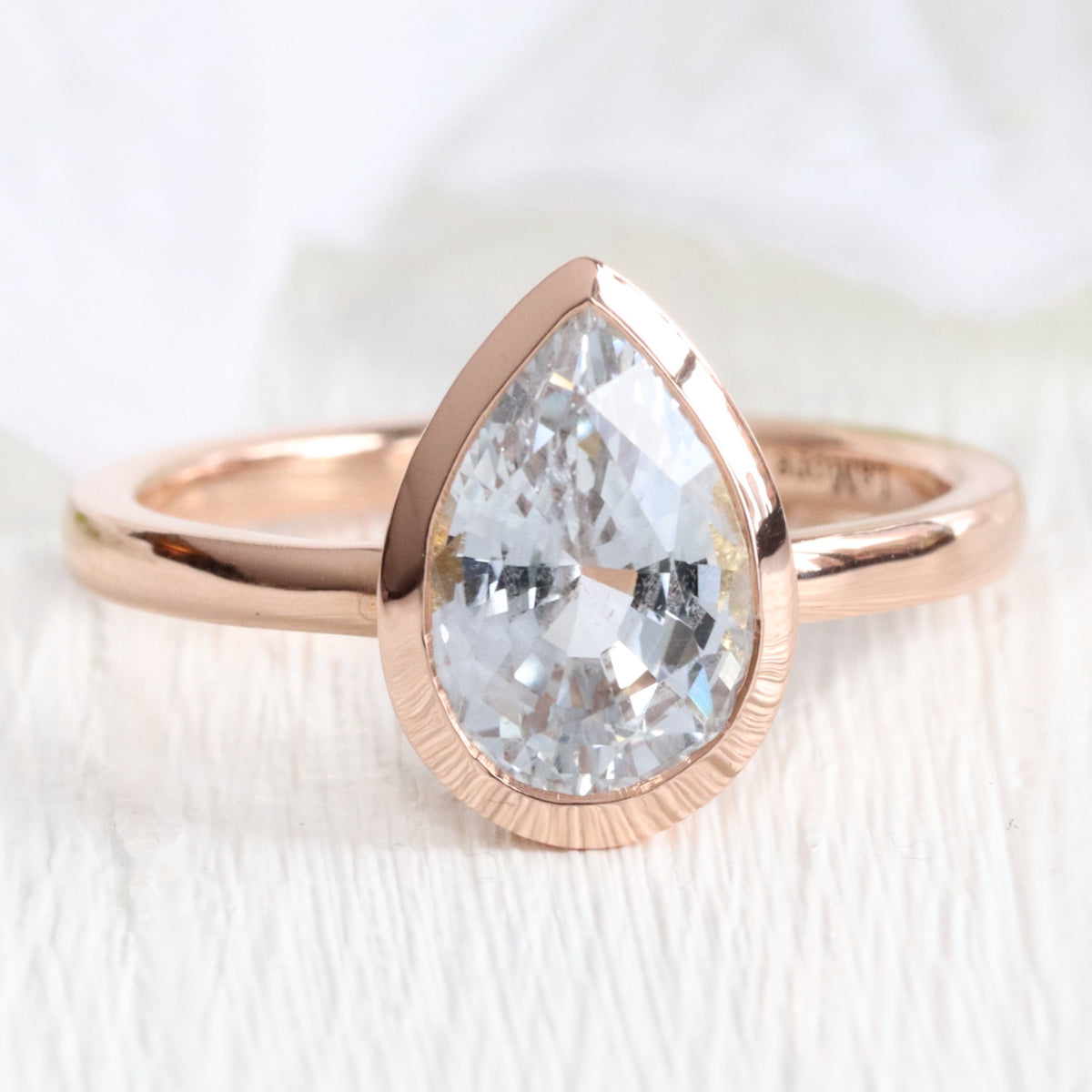 Pear aqua blue sapphire ring rose gold bezel solitaire ring la more design jewelry