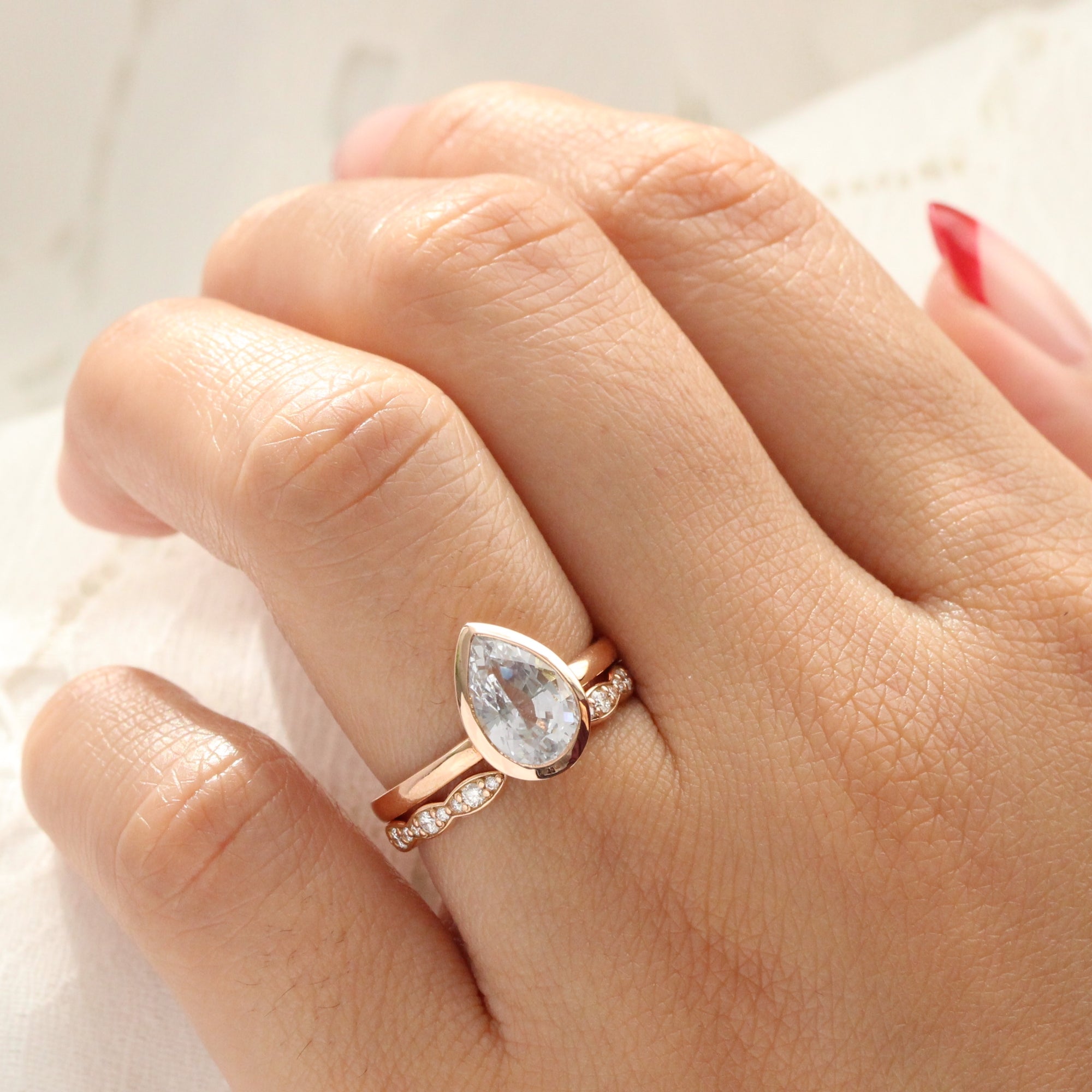 Pear aqua blue sapphire ring rose gold bezel solitaire ring la more design jewelry