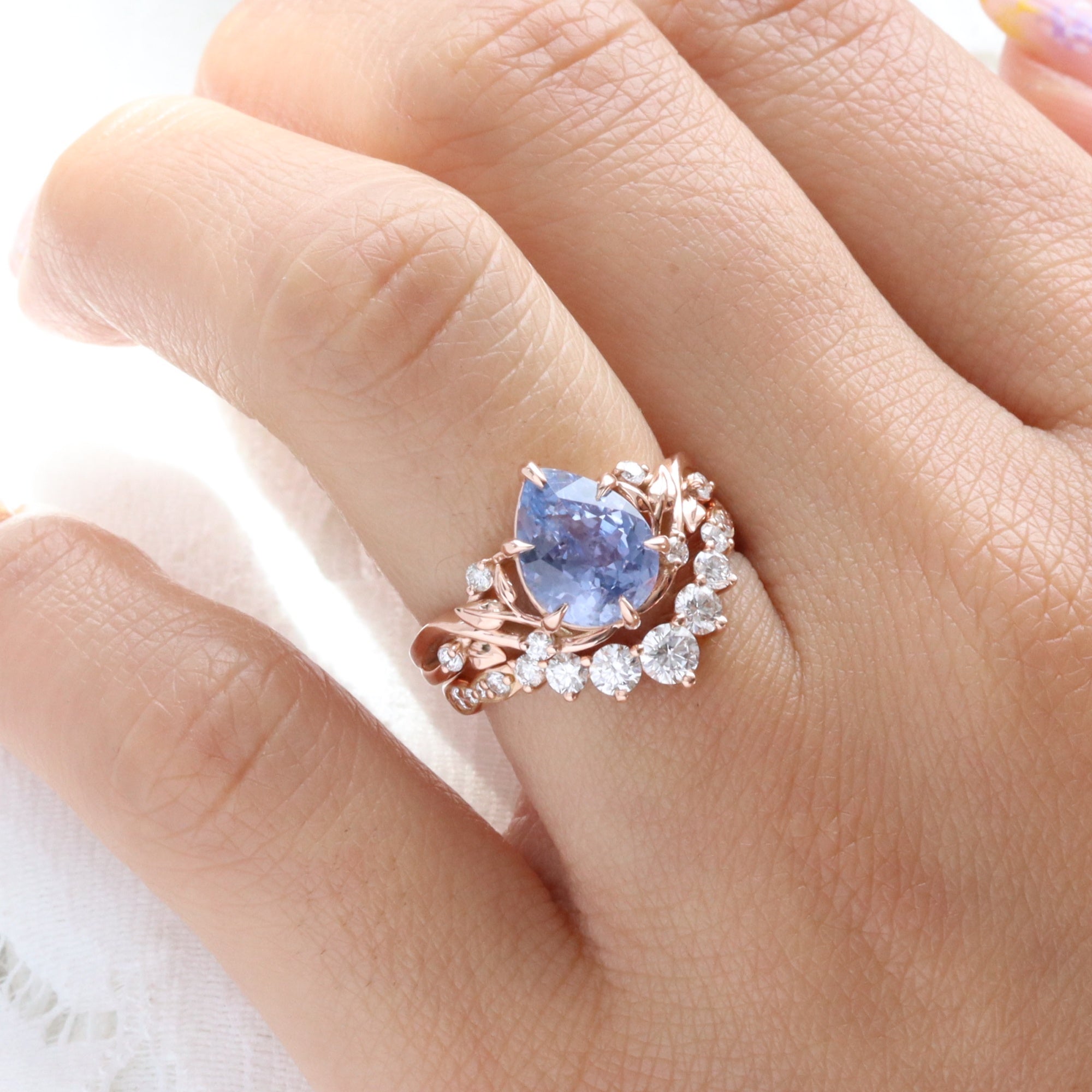 Pear lilac blue sapphire ring rose gold floral leaf diamond sapphire solitaire ring la more design jewelry