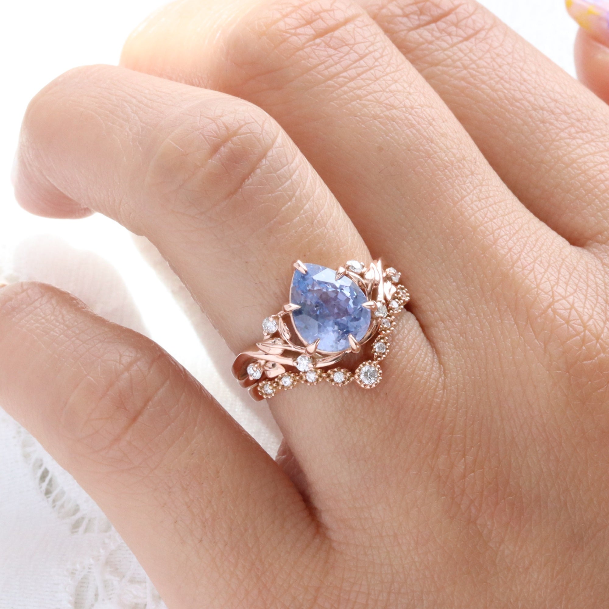 Pear lilac blue sapphire ring rose gold floral leaf diamond sapphire solitaire ring la more design jewelry