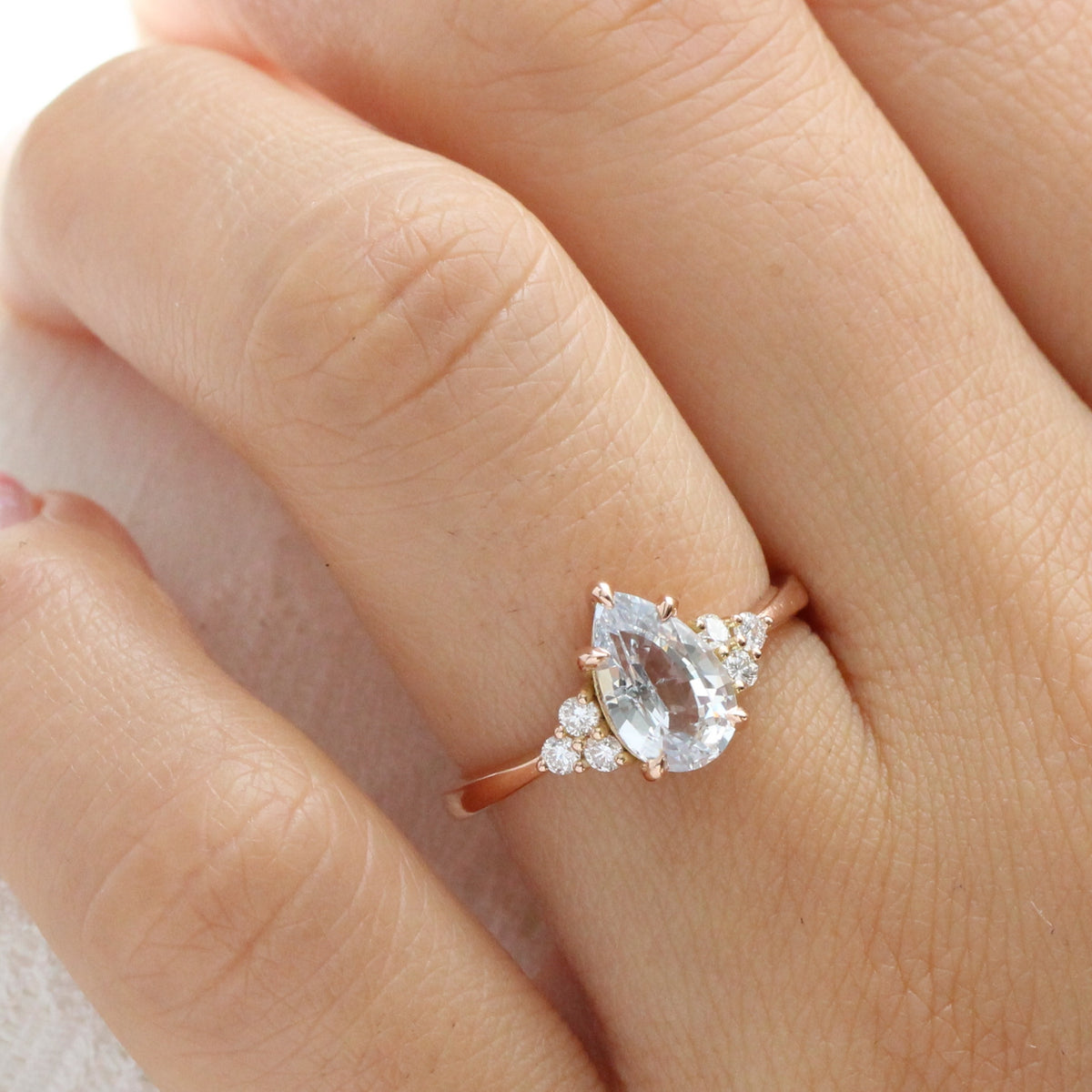 Pear cut white sapphire ring rose gold 3 stone diamond ring la more design jewelry