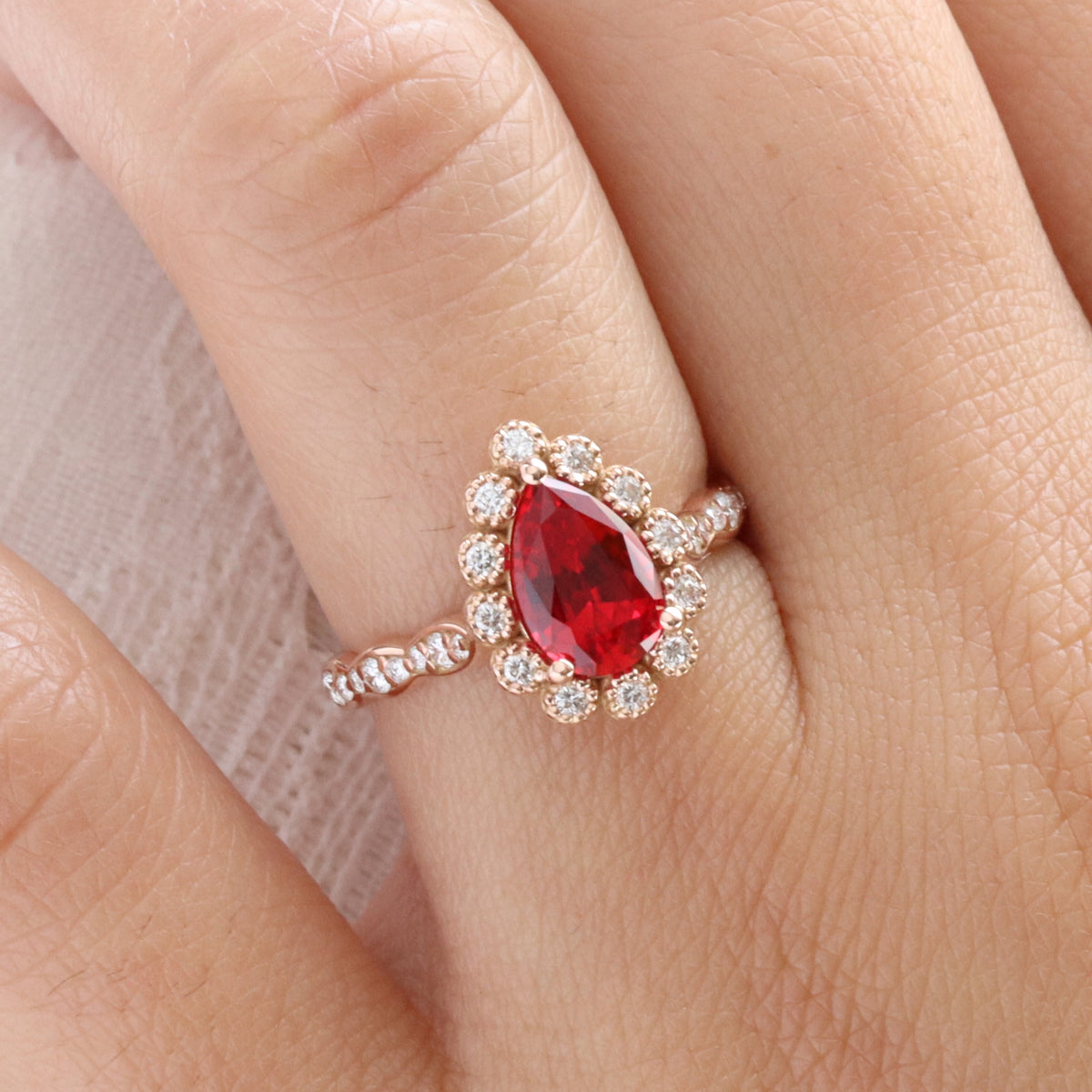 Pear ruby engagement ring rose gold vintage halo diamond ruby ring la more design jewelry