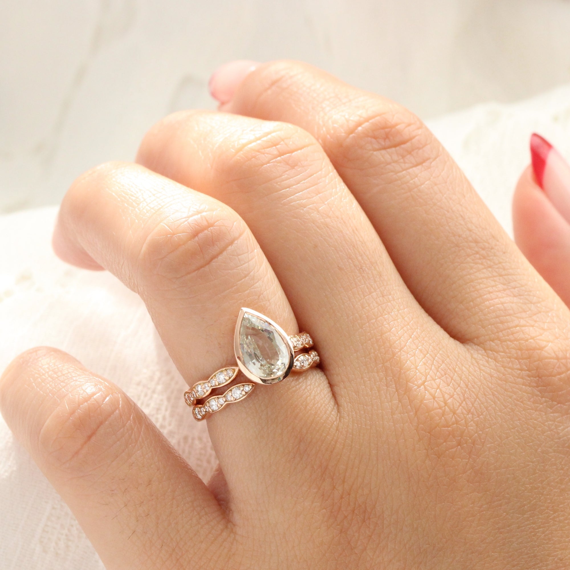 Pear seaform green sapphire ring rose gold bezel solitaire scalloped diamond band la more design jewelry