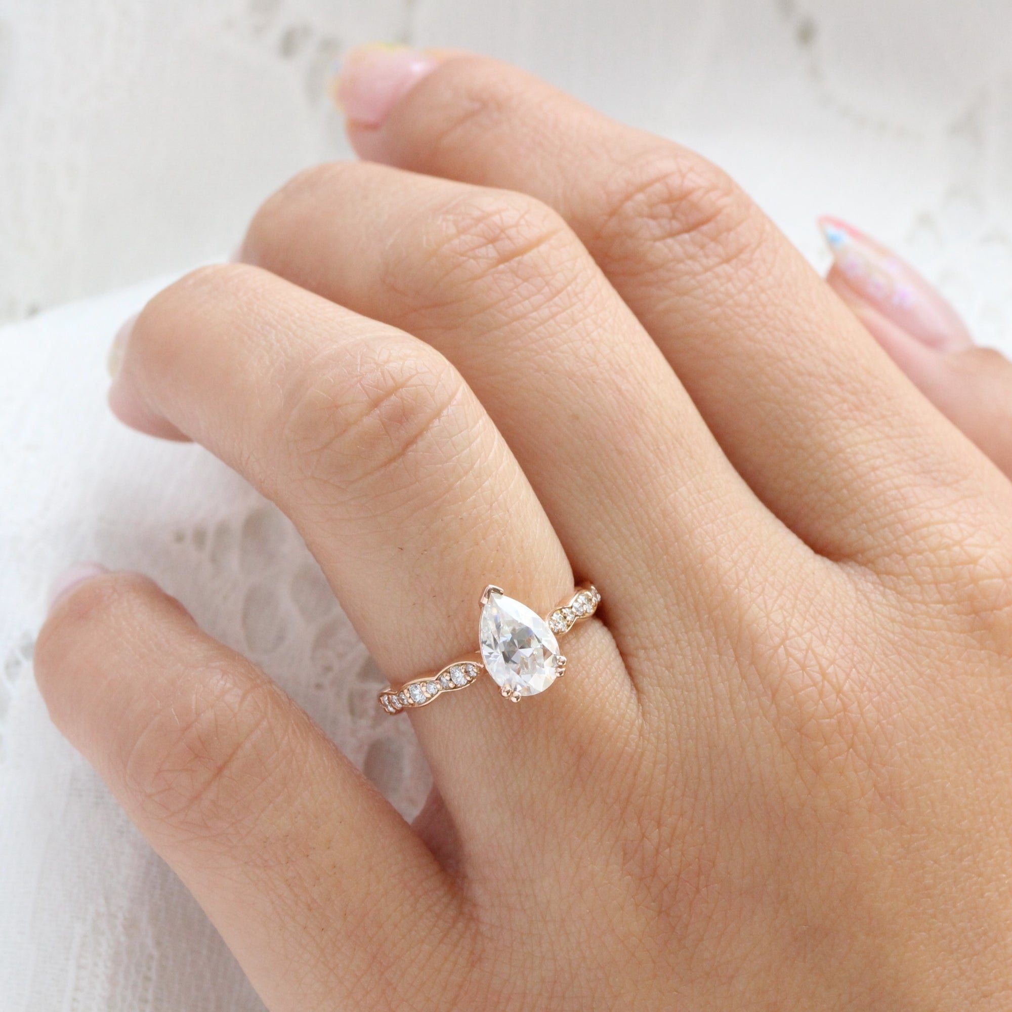 Pear moissanite diamond engagement ring rose gold solitaire moissanite ring la more design jewelry