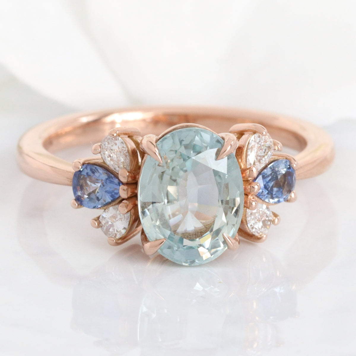 Unique aqua blue sapphire ring rose gold oval blue sapphire diamond ring 3 stone band la more design jewelry
