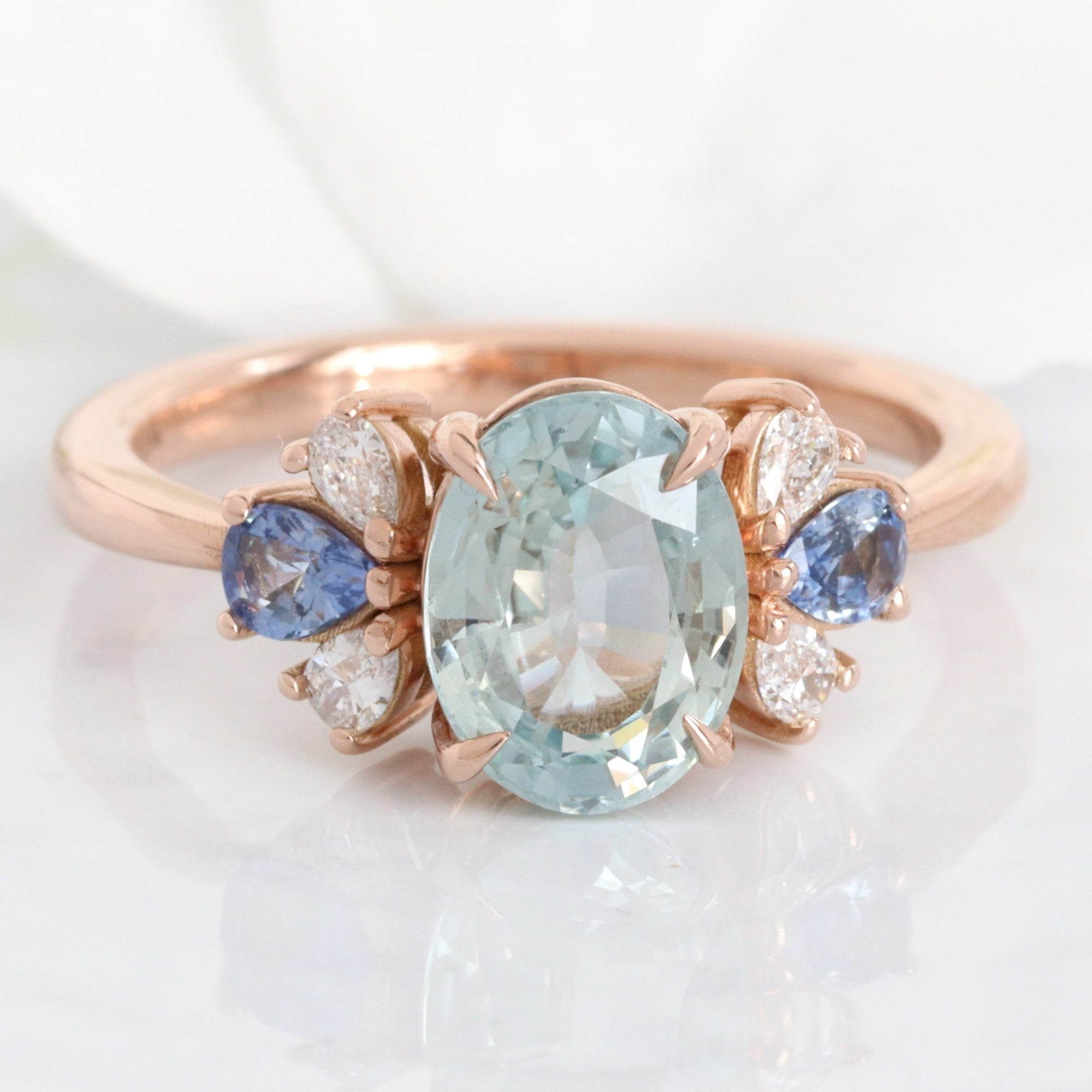 Unique aqua blue sapphire ring rose gold oval blue sapphire diamond ring 3 stone band la more design jewelry
