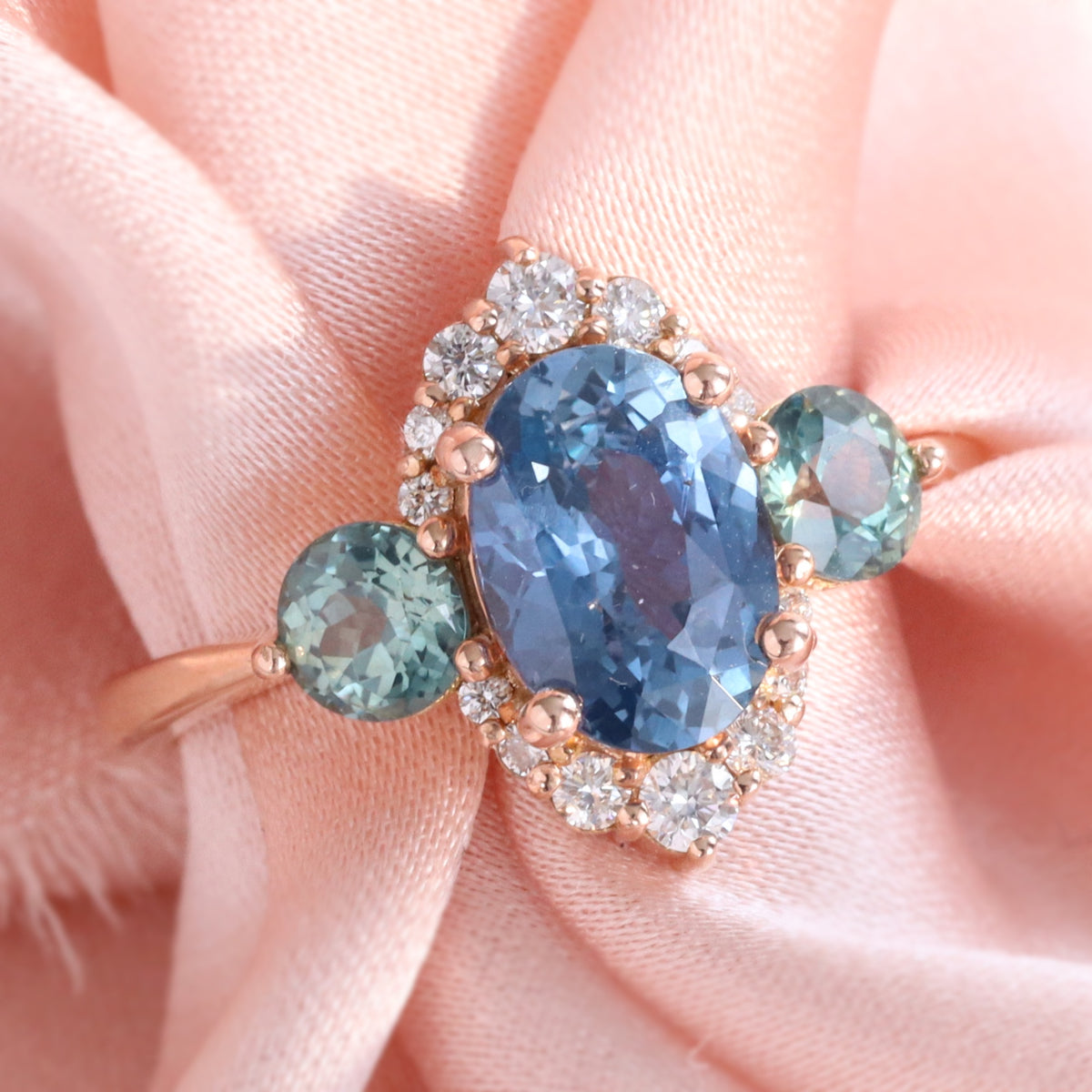 Unique teal blue sapphire ring rose gold diamond halo 3 stone ring la more design jewelry