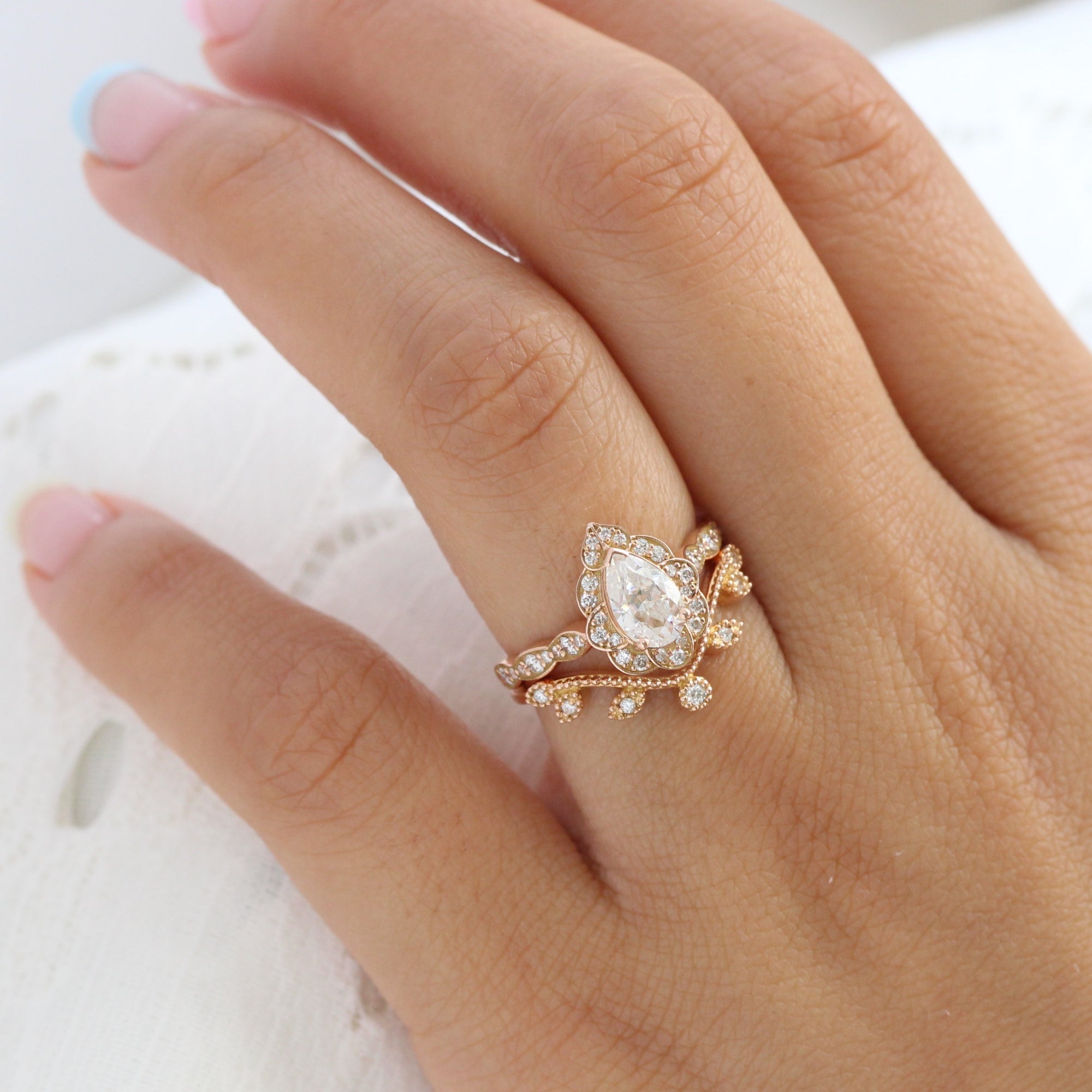 vintage floral pear moissanite ring bridal set rose gold large diamond curved wedding band la more design jewelry