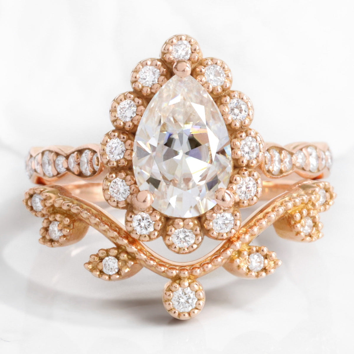 Vintage style pear moissanite ring bridal set rose gold curved leaf diamond wedding ring stack la more design jewelry