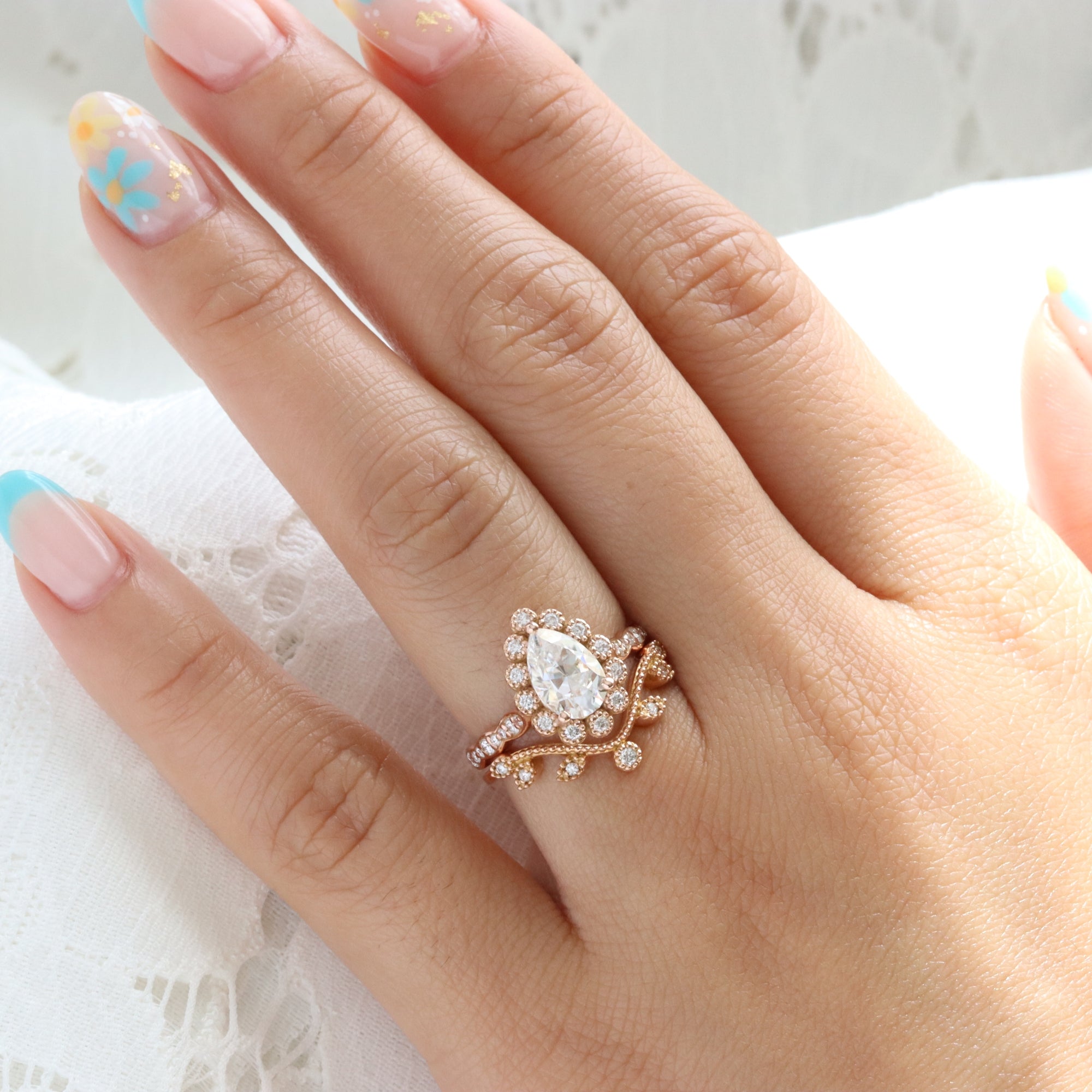Vintage style pear moissanite ring bridal set rose gold curved leaf diamond wedding ring stack la more design jewelry