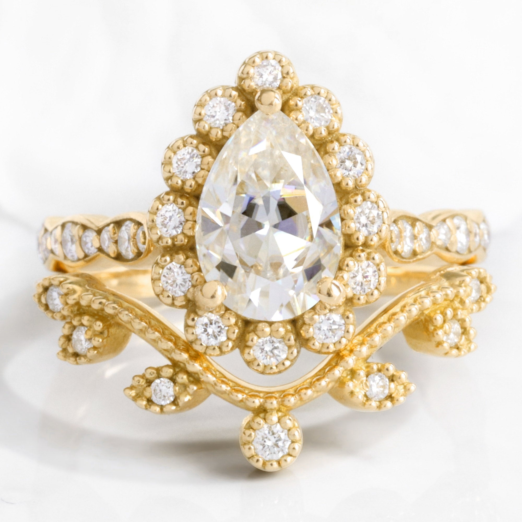 Vintage style pear moissanite ring bridal set yellow gold curved leaf diamond wedding ring stack la more design jewelry