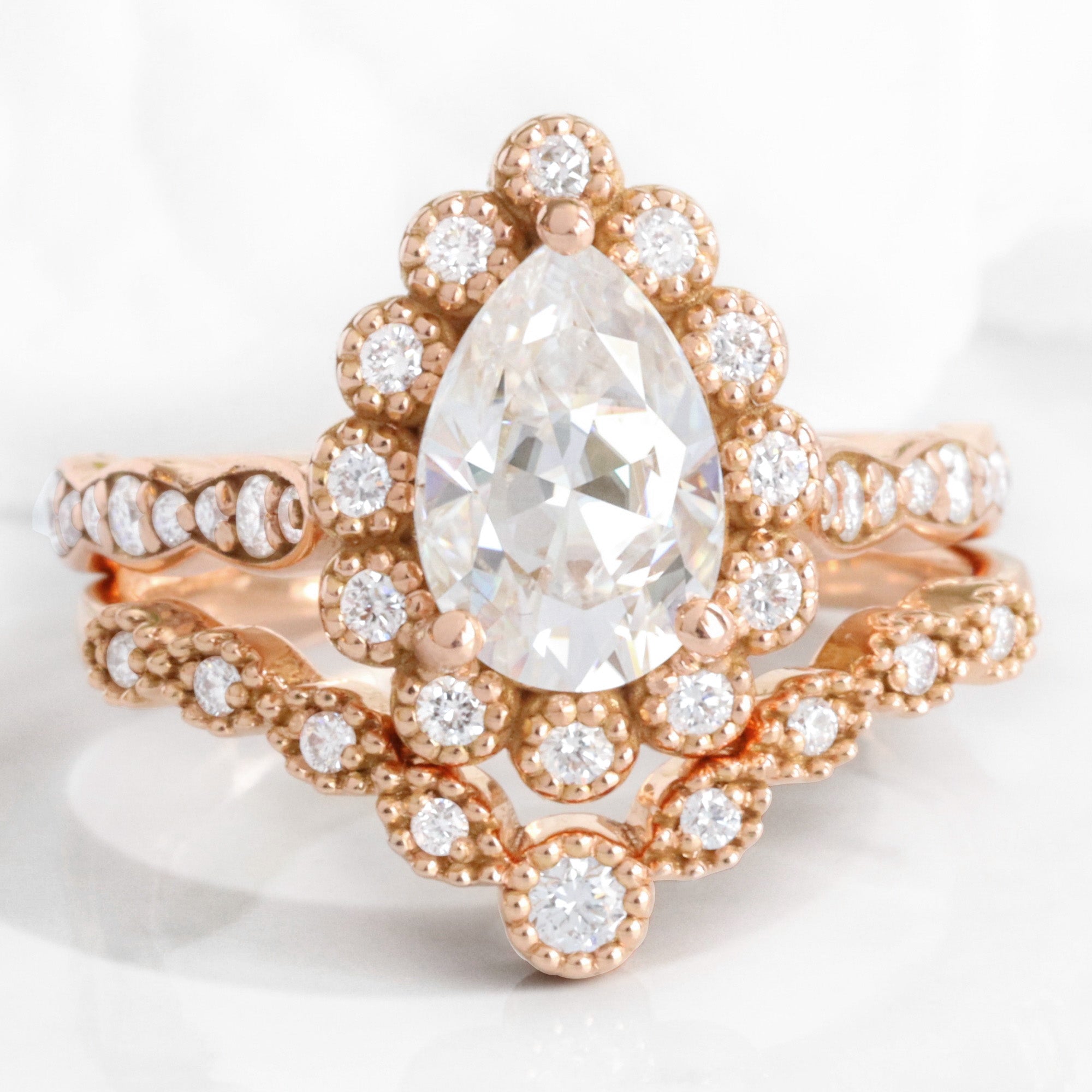 Vintage style pear moissanite ring stack rose gold curved diamond wedding ring bridal set la more design jewelry