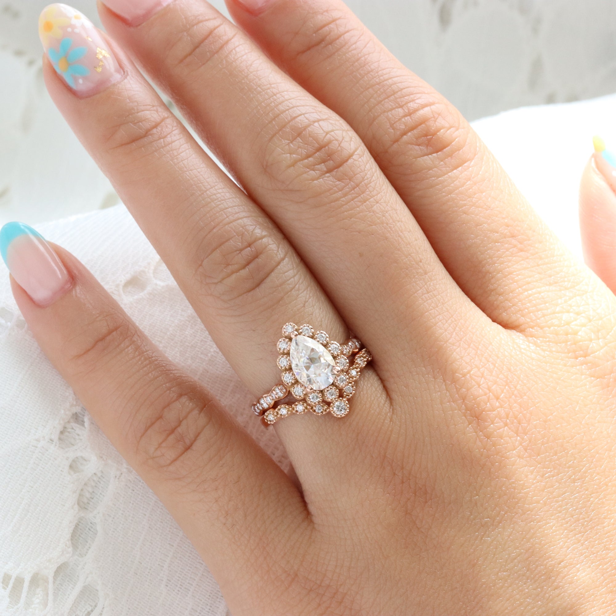 Vintage style pear moissanite ring stack rose gold curved diamond wedding ring bridal set la more design jewelry