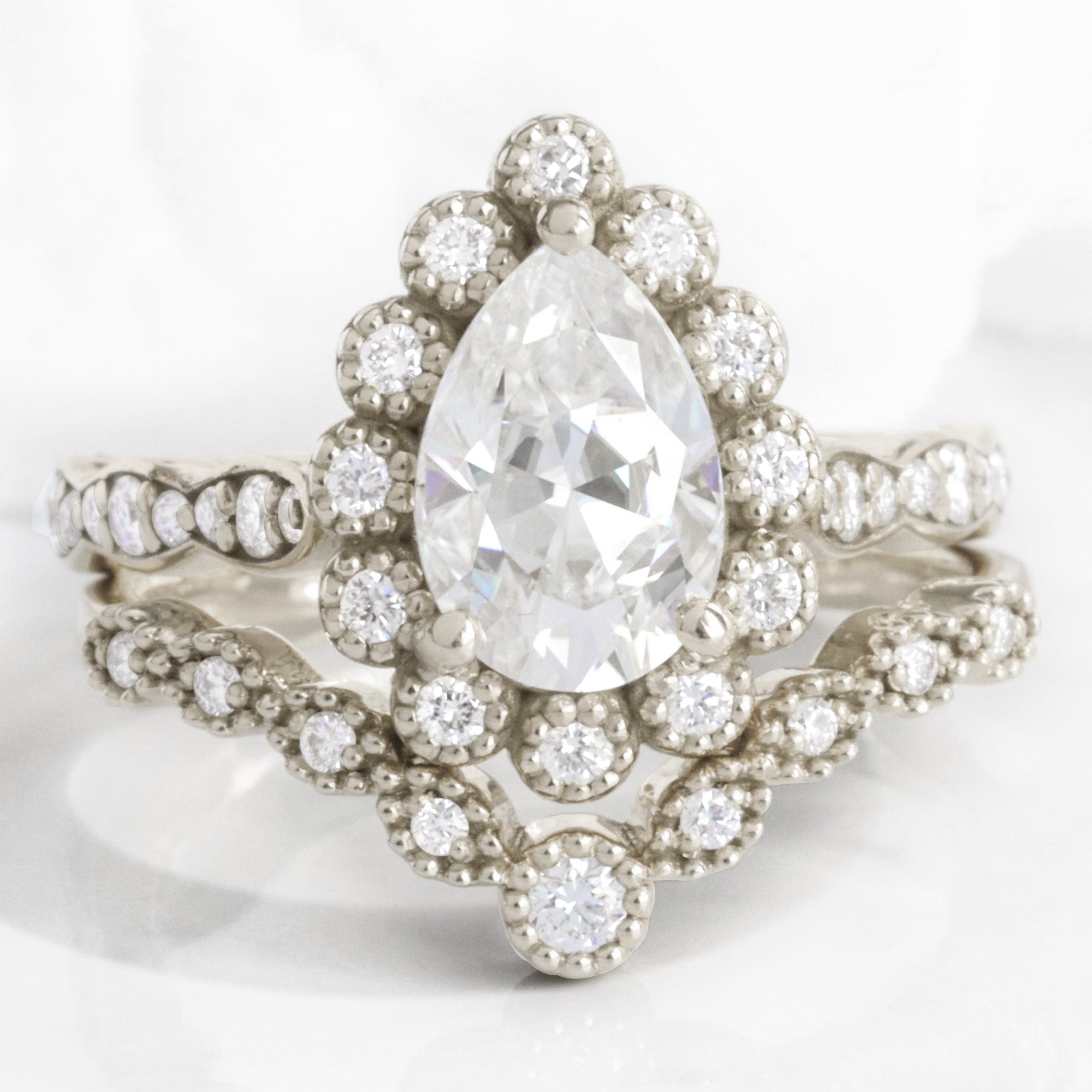 Vintage style pear moissanite ring stack white gold curved diamond wedding ring bridal set la more design jewelry
