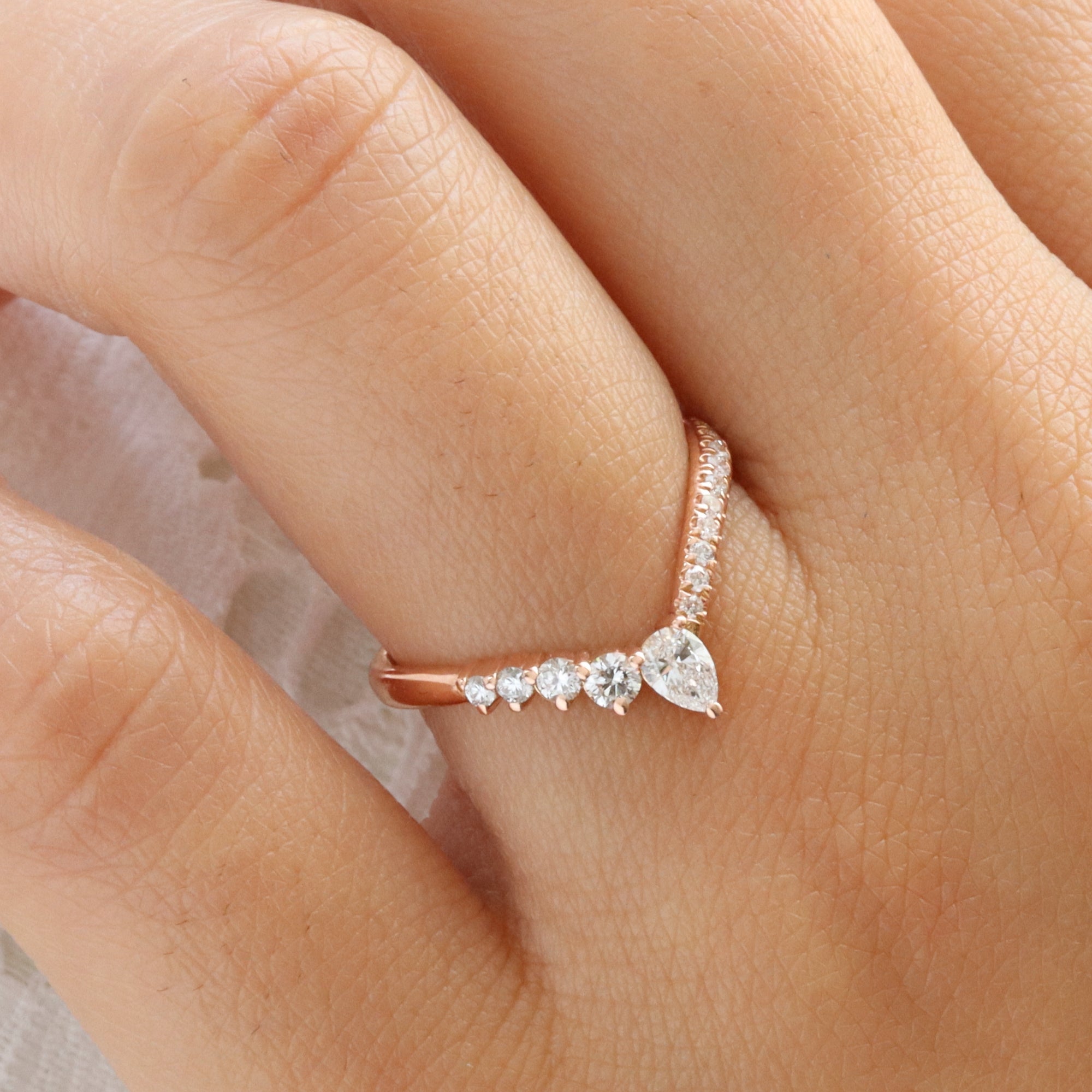 Wishbone diamond wedding ring rose gold V shaped curved pave wedding band la more design jewelry
