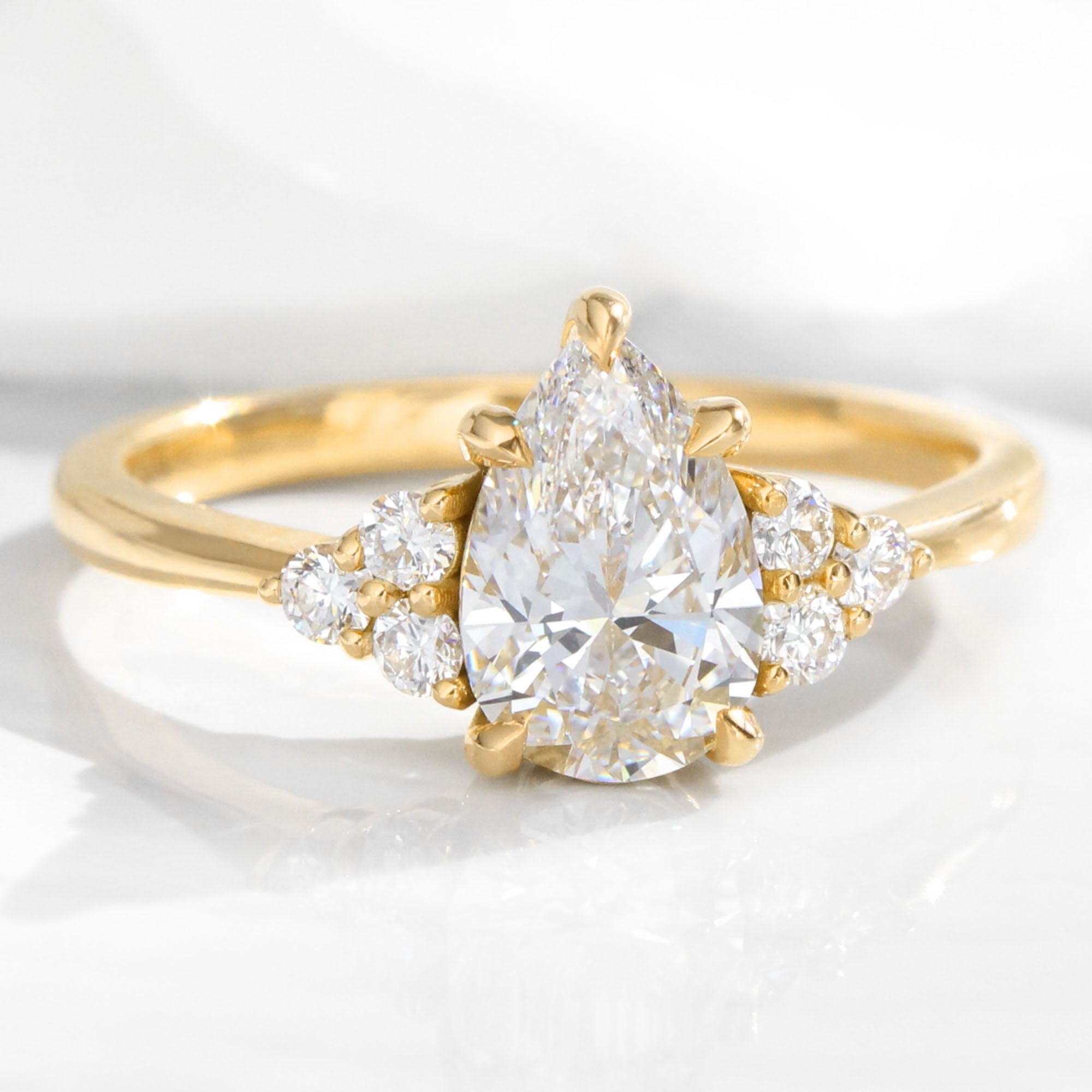 lab grown diamond 3 stone engagement ring yellow gold pear diamond cluster ring la more design jewelry