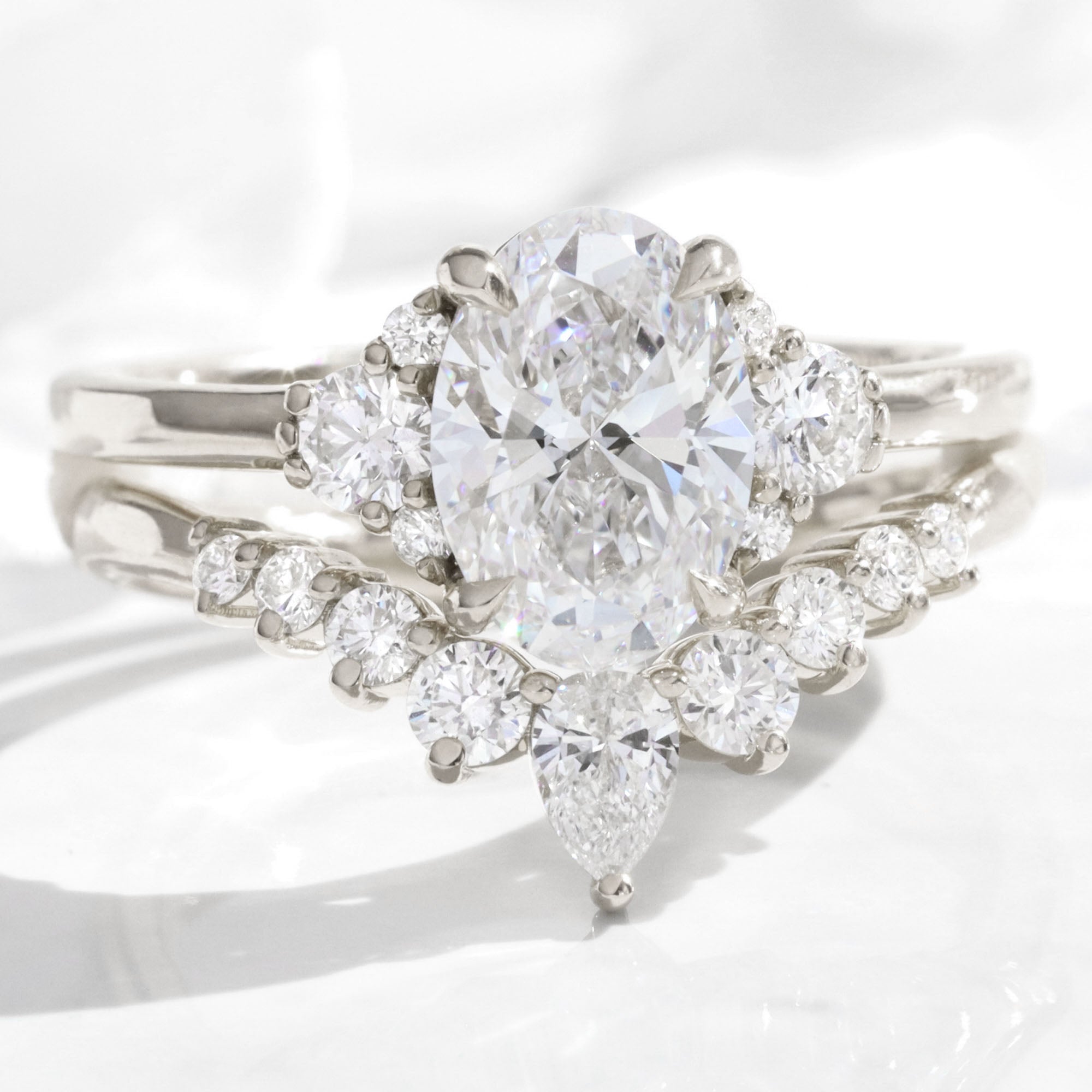 large oval lab diamond 3 stone ring bridal set white gold V shaped diamond ring stack la more design jewelry