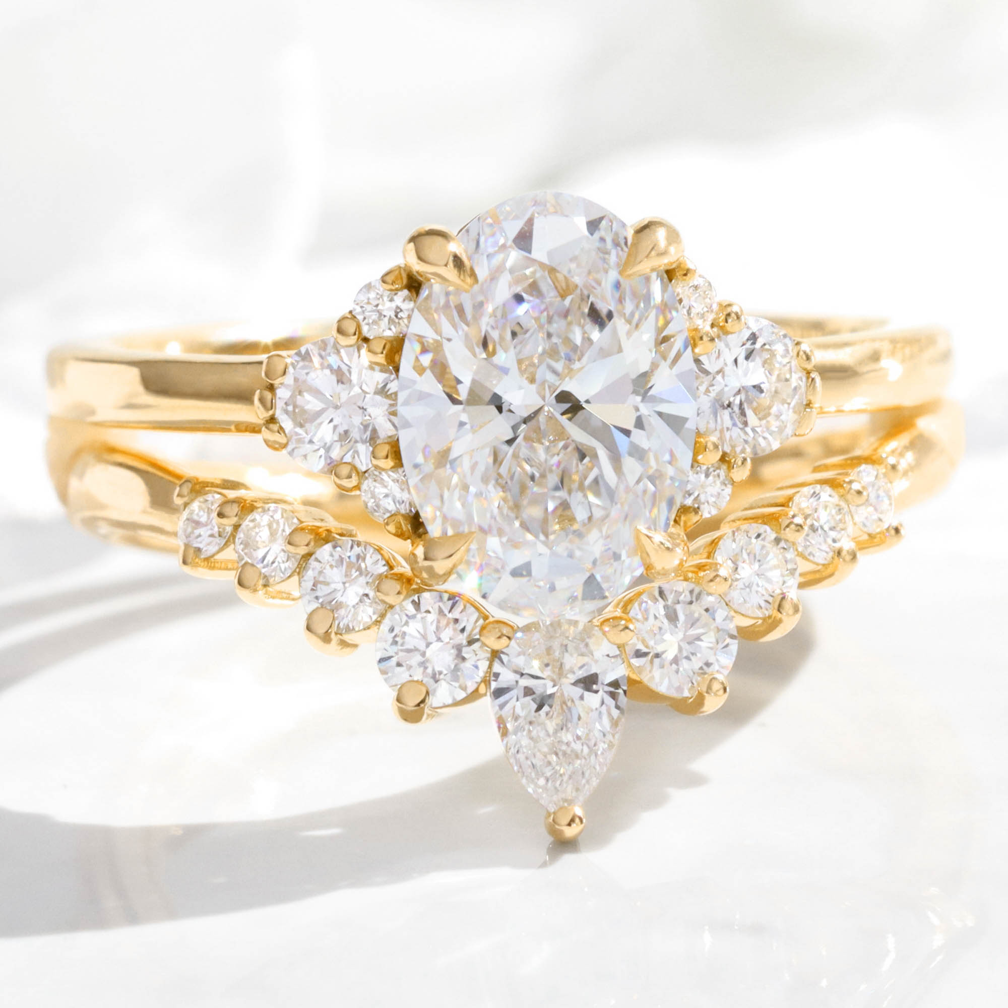 large oval lab diamond 3 stone ring bridal set yellow gold V shaped diamond ring stack la more design jewelry
