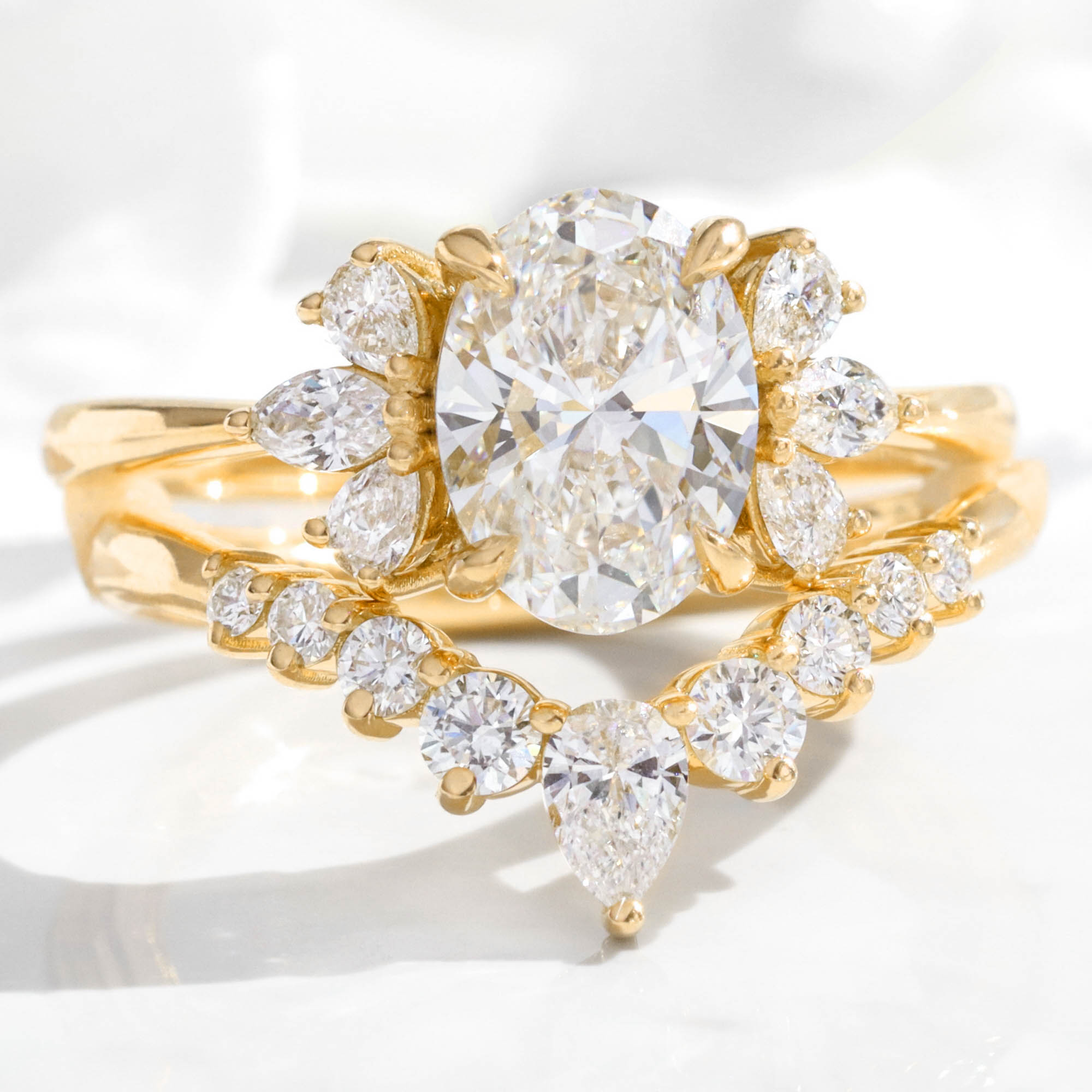 large oval lab diamond 3 stone ring stack yellow gold V shaped diamond ring bridal set la more design jewelry