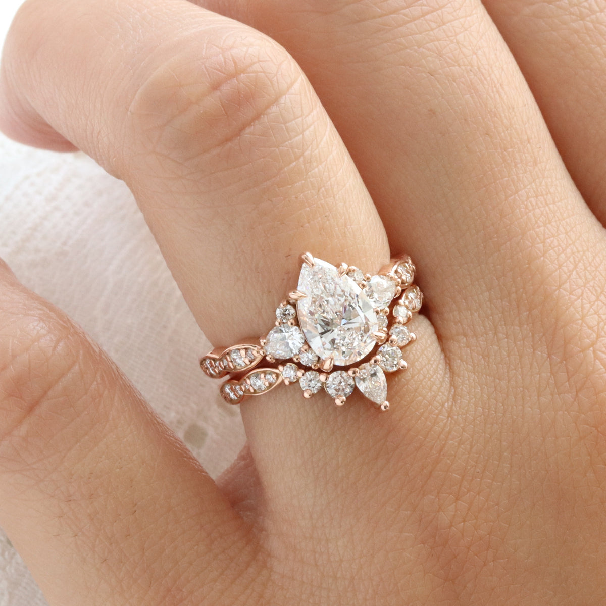 large pear lab grown diamond 3 stone ring bridal set rose gold curved diamond ring stack la more design jewelry