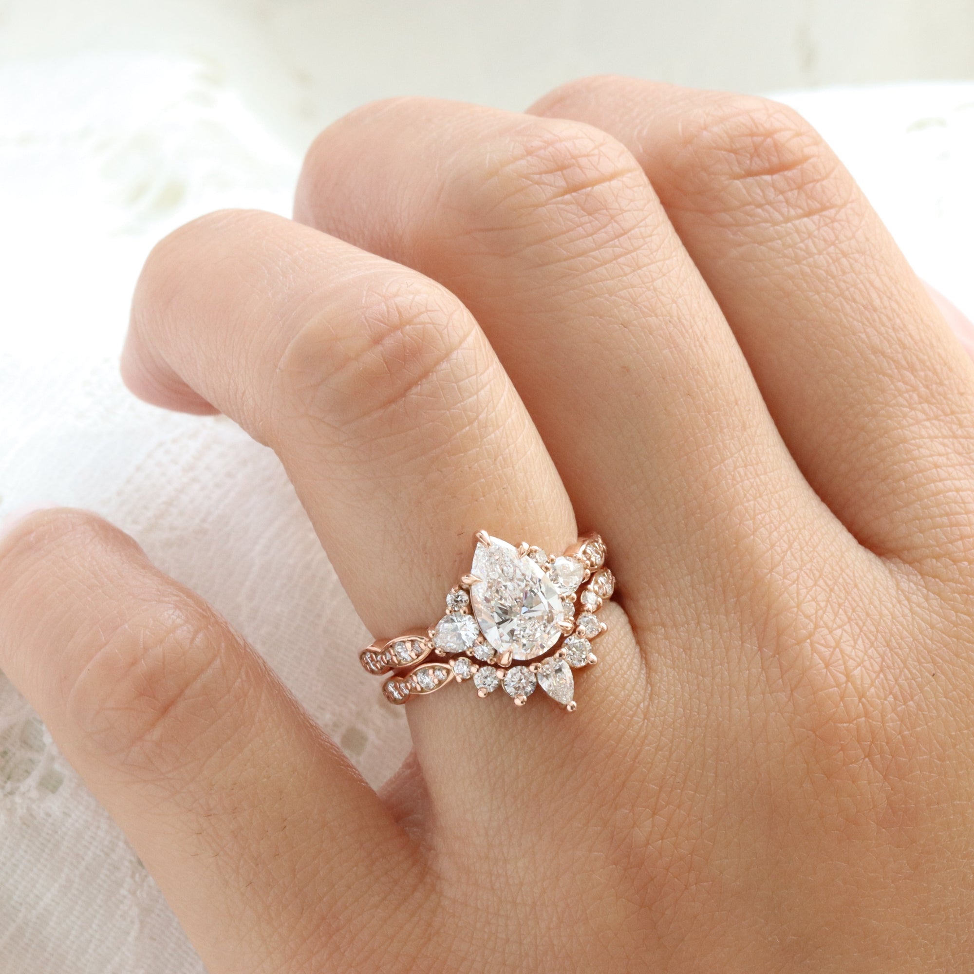 large pear lab grown diamond 3 stone ring bridal set rose gold curved diamond ring stack la more design jewelry