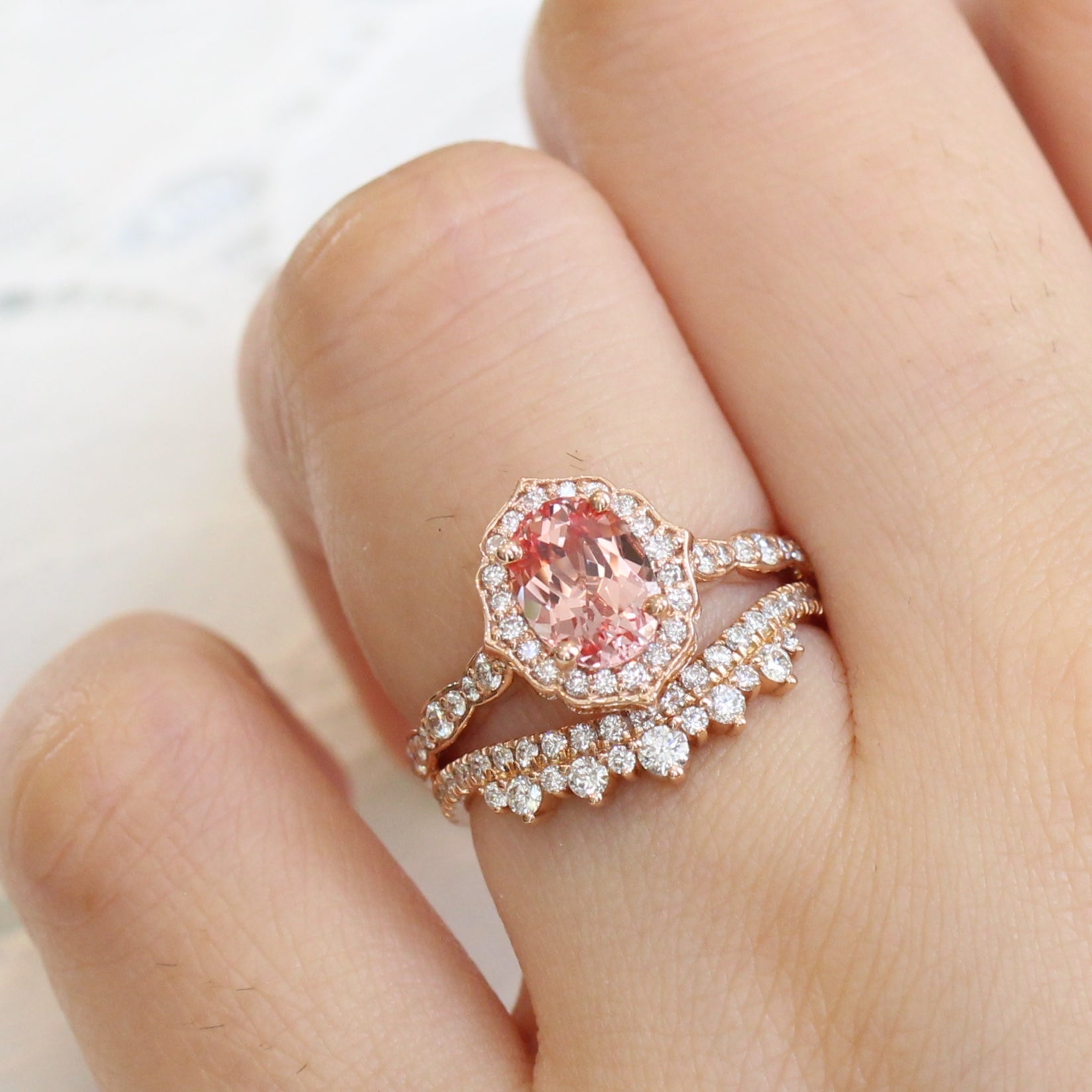 peach sapphire ring and curved crown diamond band in rose gold bridal set by la more design JEWELRY
