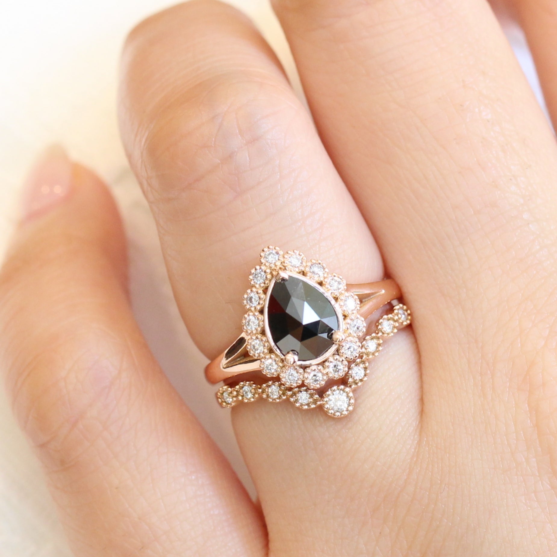 pear rose cut black diamond ring rose gold and curved diamond wedding ring set by la more design jewelry
