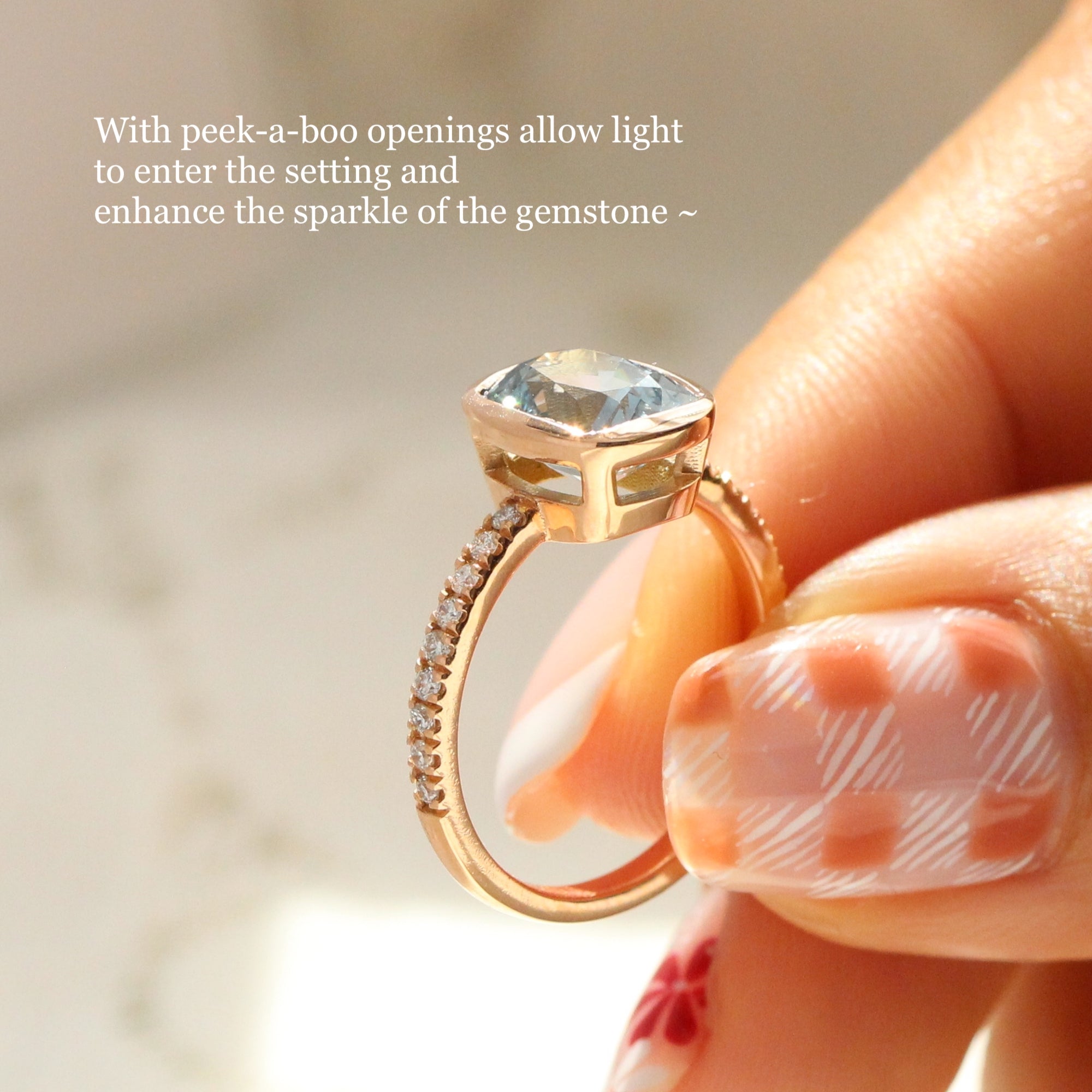 peekaboo bezel set sapphire engagement ring on pave band