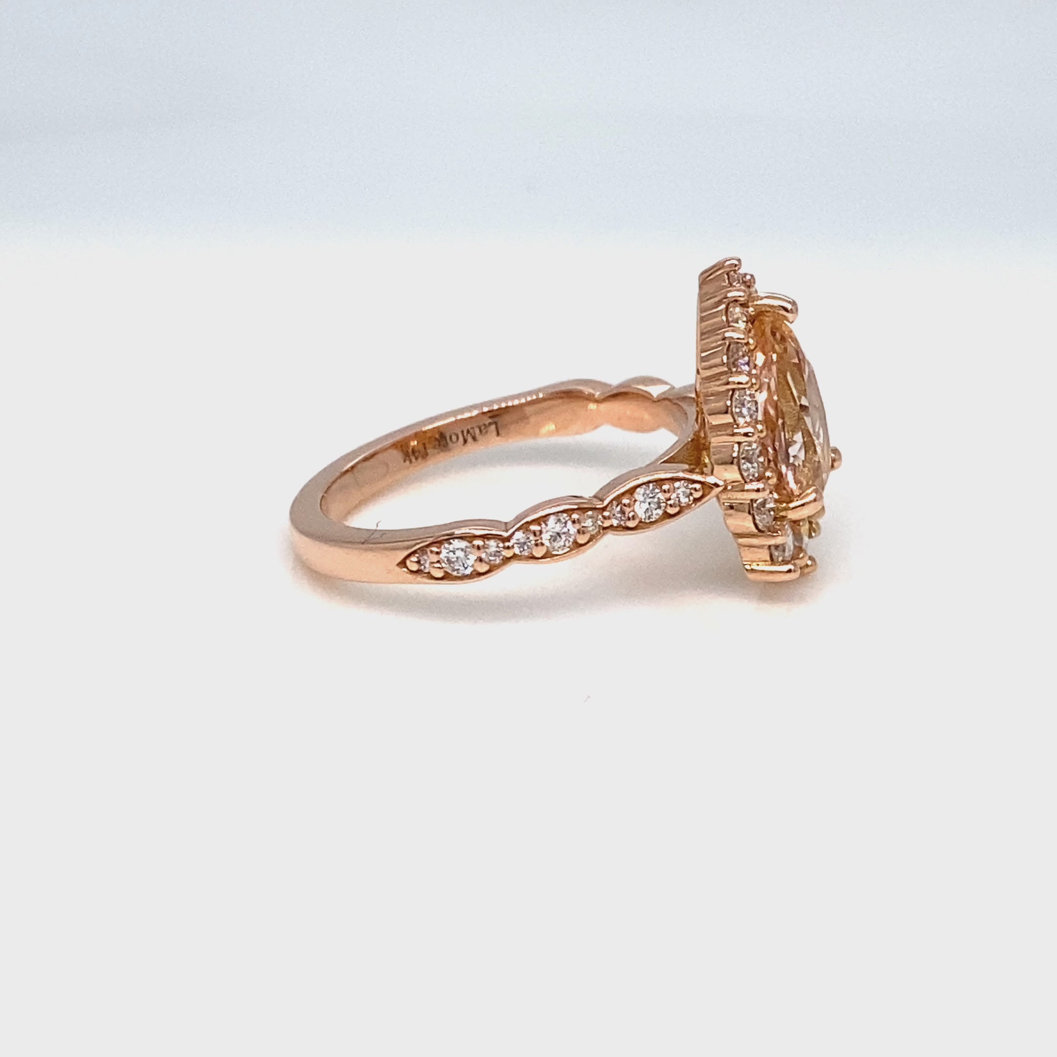 Pear peach sapphire engagement ring rose gold halo diamond pink sapphire ring la more design jewelry