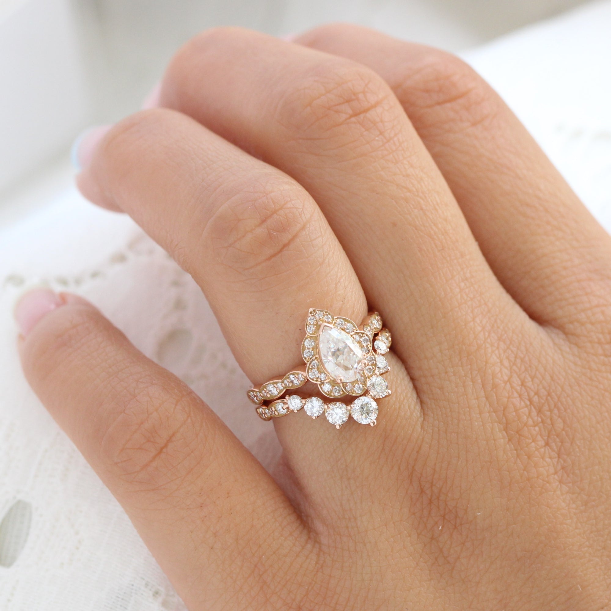 vintage floral pear moissanite ring bridal set rose gold large diamond curved wedding band la more design jewelry