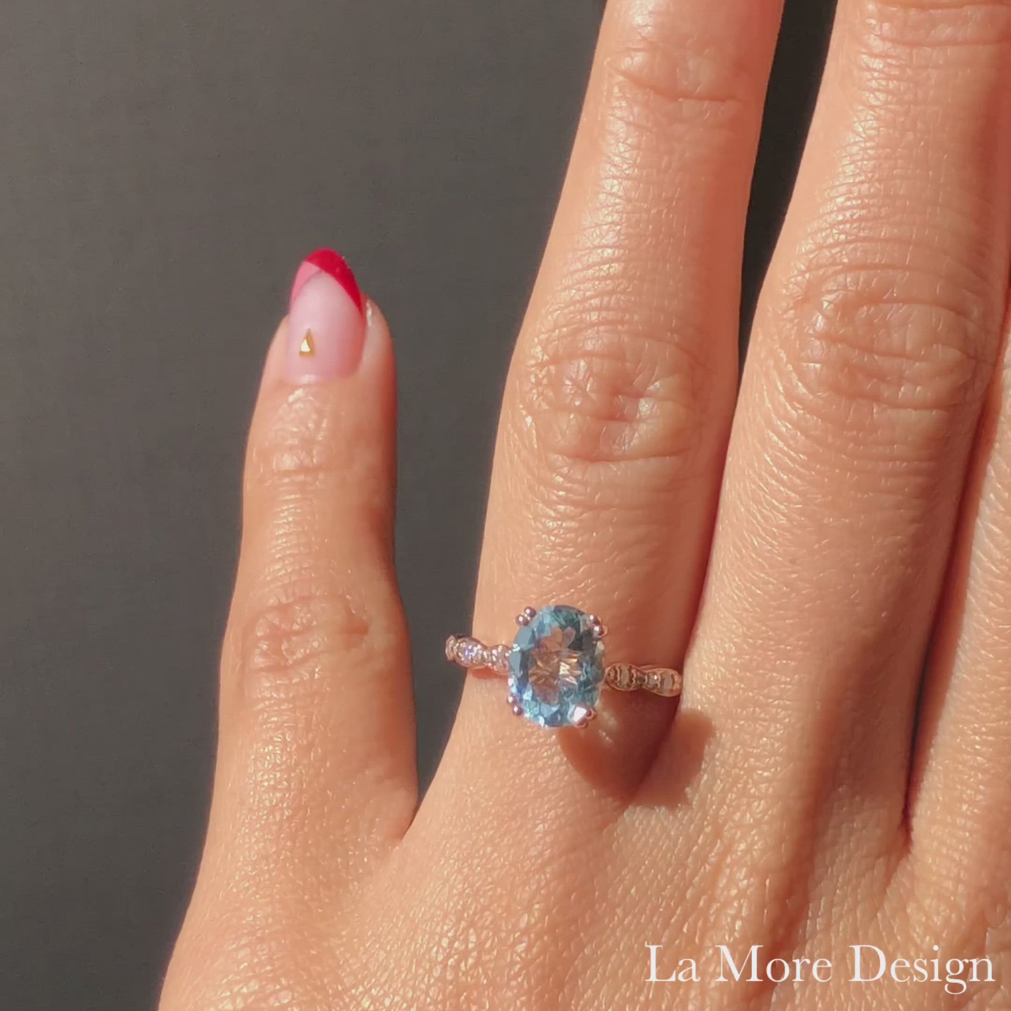 Graceful solitaire engagement ring features a 9x7mm oval cut aquamarine set in 14k rose gold diamond scalloped band for a timelessly elegant look. Can be made in your choice of platinum or 18k or 14k yellow, rose or white gold. Matching bridal ring set is available. Express your love with this beautiful aquamarine ring!