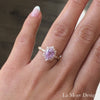 This timelessly elegant and unique lavender purple sapphire engagement ring is crafted in a 14k rose gold Tiara Halo Diamond ring setting with a large 2.26-carat oval cut natural sapphire center ~the total gemstone and diamond weight of the whole ring is 2.76 ct.tw.  This one-of-a-kind sapphire ring is perfect for brides looking for non-traditional engagement rings. All our wedding bands can pair beautifully with this gorgeous tiara halo diamond sapphire ring!