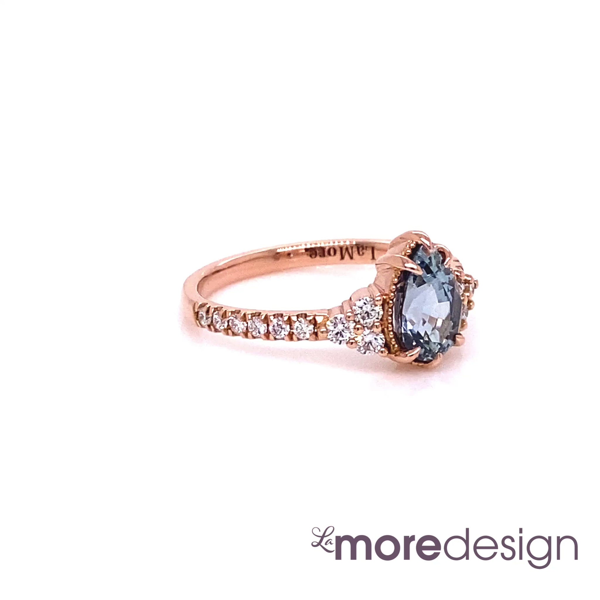 Gorgeous vintage-inspired 3 stone ring with a modern twist! This aqua blue sapphire diamond engagement ring in a 14k rose gold vintage style three stone ring setting features a 1.33 carats pear cut natural aqua blue sapphire center adorned with three brilliant-cut white diamonds on each side. To add extra sparkles to this already beautiful diamond ring, it is finished in a pave diamond band to complete the stunning look ~  the total gemstone and diamond weight of the whole ring is 1.67 carats.