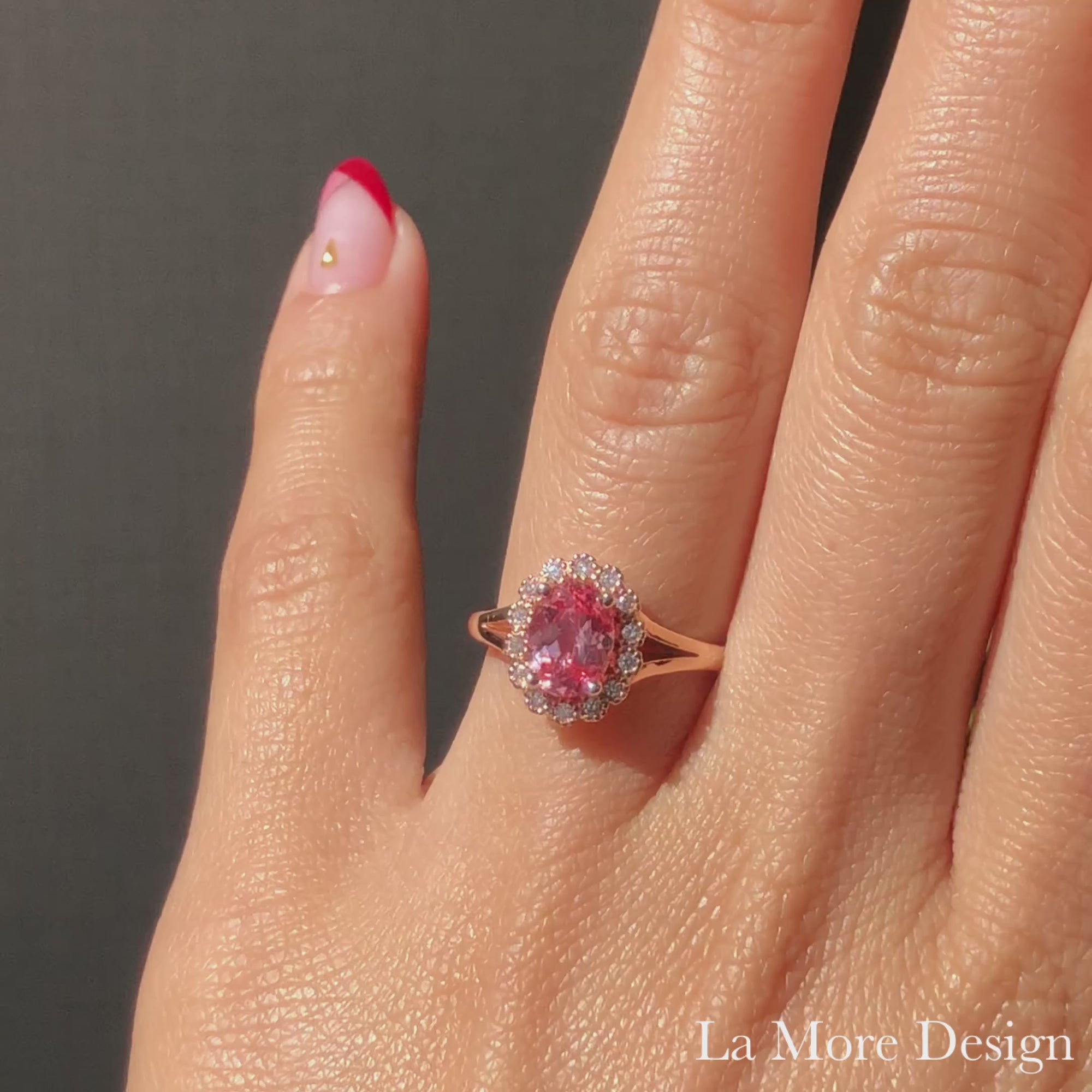 oval peach sapphire engagement ring in rose gold halo diamond band by la more design