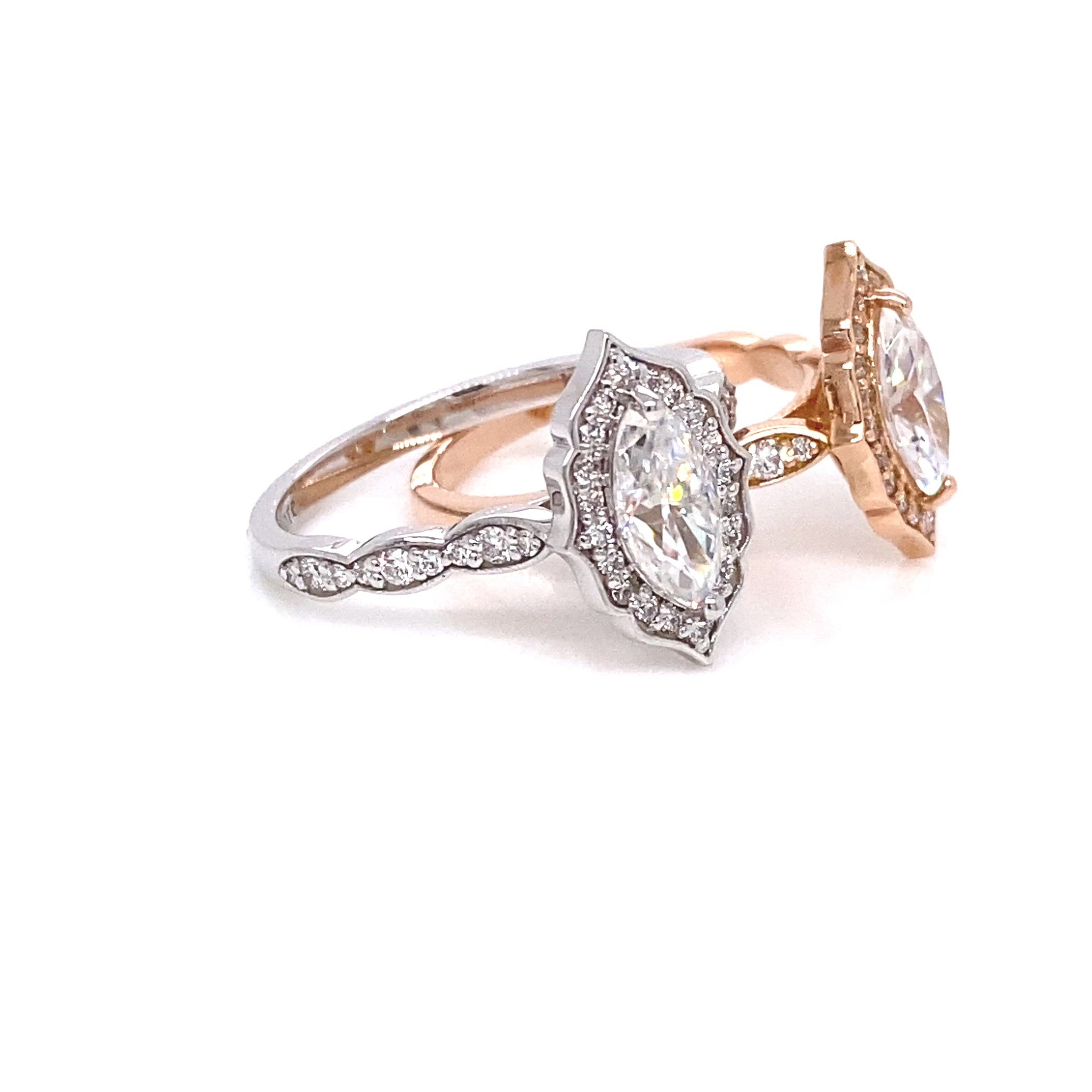 Breathtakingly unique creation! This moissanite engagement ring is set in 14k white gold and rose gold vintage floral diamond ring setting with a 9x4.5mm marquise cut Forever One Moissanite. This marquise moissanite ring is perfect for brides looking for non-traditional engagement rings. It can be made in your choice of platinum or 18k or 14k yellow, rose or white gold. Matching bridal ring set is available.