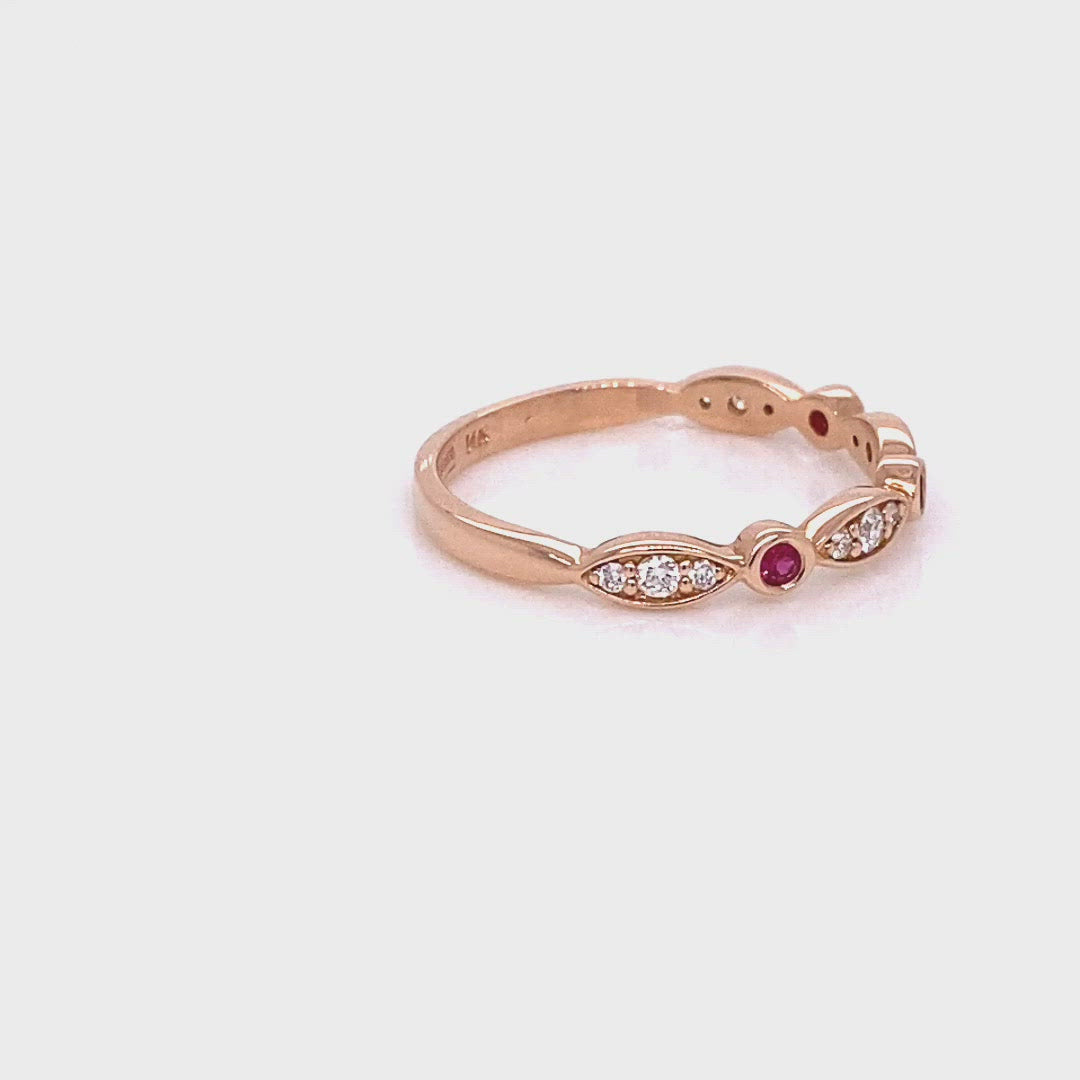 ruby and diamond wedding ring in rose gold bezel set half eternity wedding band by la more design jewelry
