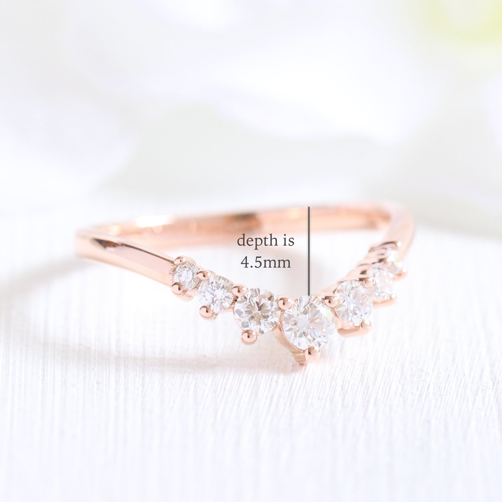 7 stone diamond wedding ring in rose gold curved band by la more design jewelry