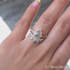 Breathtakingly one of a kind creation! This unique grey diamond bridal set features a pear salt and pepper diamond engagement ring in 14k rose gold vintage floral diamond ring setting with an a 0.81 carat pear cut natural grey diamond center. For a gorgeous effect, a curved large tiara grey and white diamond wedding band is created to be paired with this vintage-inspired grey diamond engagement ring. This salt and pepper grey diamond wedding set is perfect for brides looking for a one-of-a-kind diamond ring