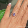 This breathtakingly gorgeous sapphire engagement ring is crafted in 14k rose gold vintage floral diamond ring setting with a 1.25-carat pear cut natural lavender purple sapphire center ~ total gemstone and diamond weight of the whole ring is 1.57 ct.tw.  This unique yet elegant vintage-inspired pear cut engagement ring will guarantee a big smile on your future bride's face! All our wedding bands can pair beautifully with this gorgeous vintage floral diamond sapphire ring!