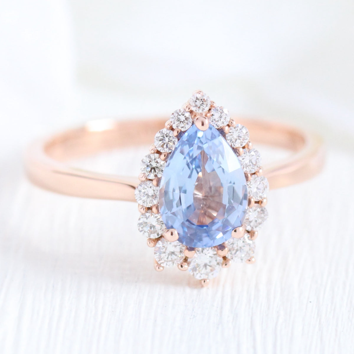 Aqua Blue Sapphire Engagement Ring in Rose Gold Halo Diamond Pear Ring by La More Design Jewelry