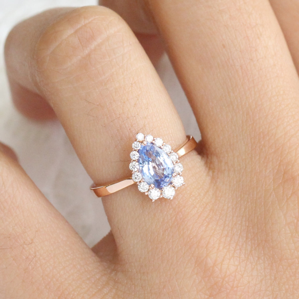 Aqua Blue Sapphire Engagement Ring in Rose Gold Halo Diamond Pear Ring by La More Design Jewelry