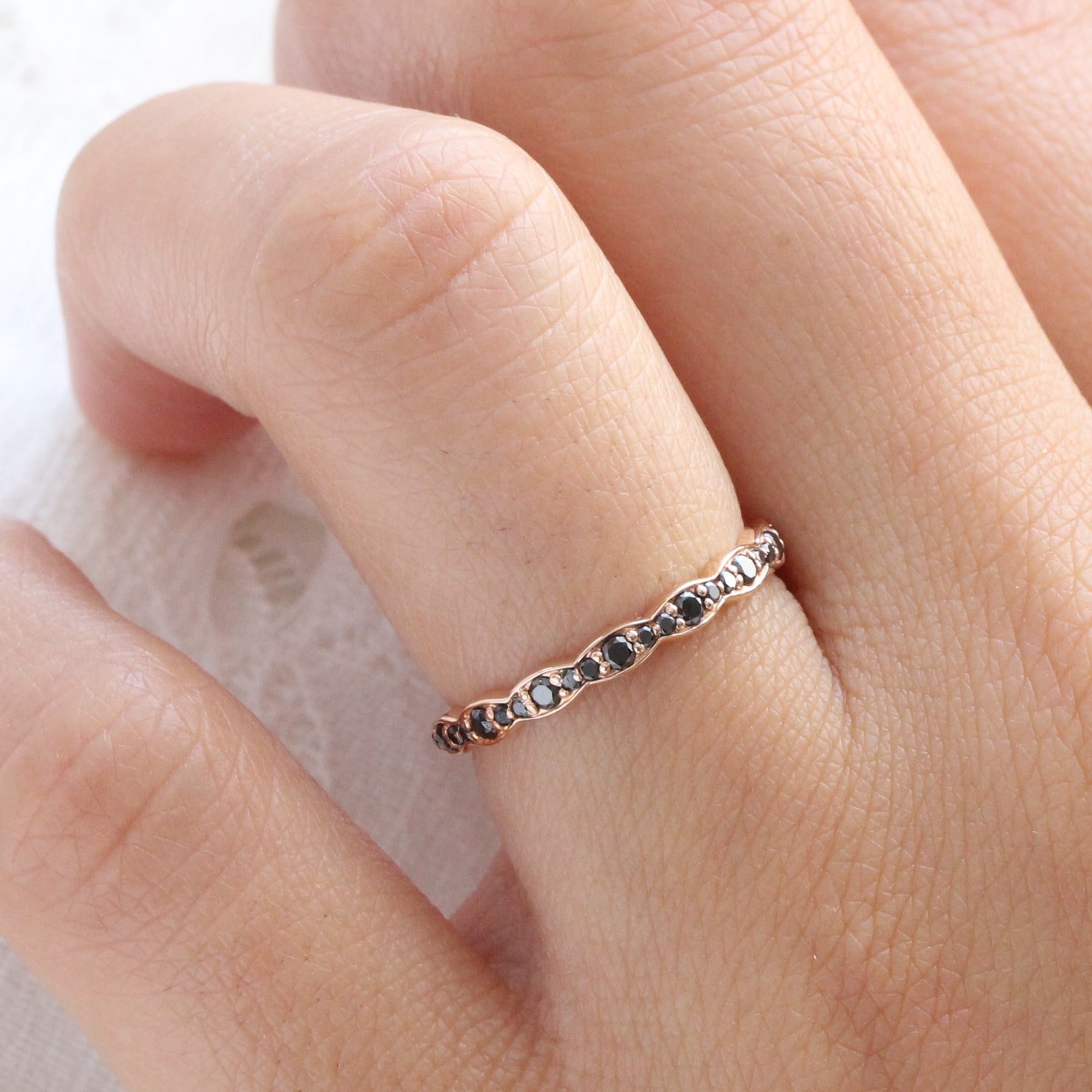 Black diamond wedding ring in rose gold scalloped band by la more design