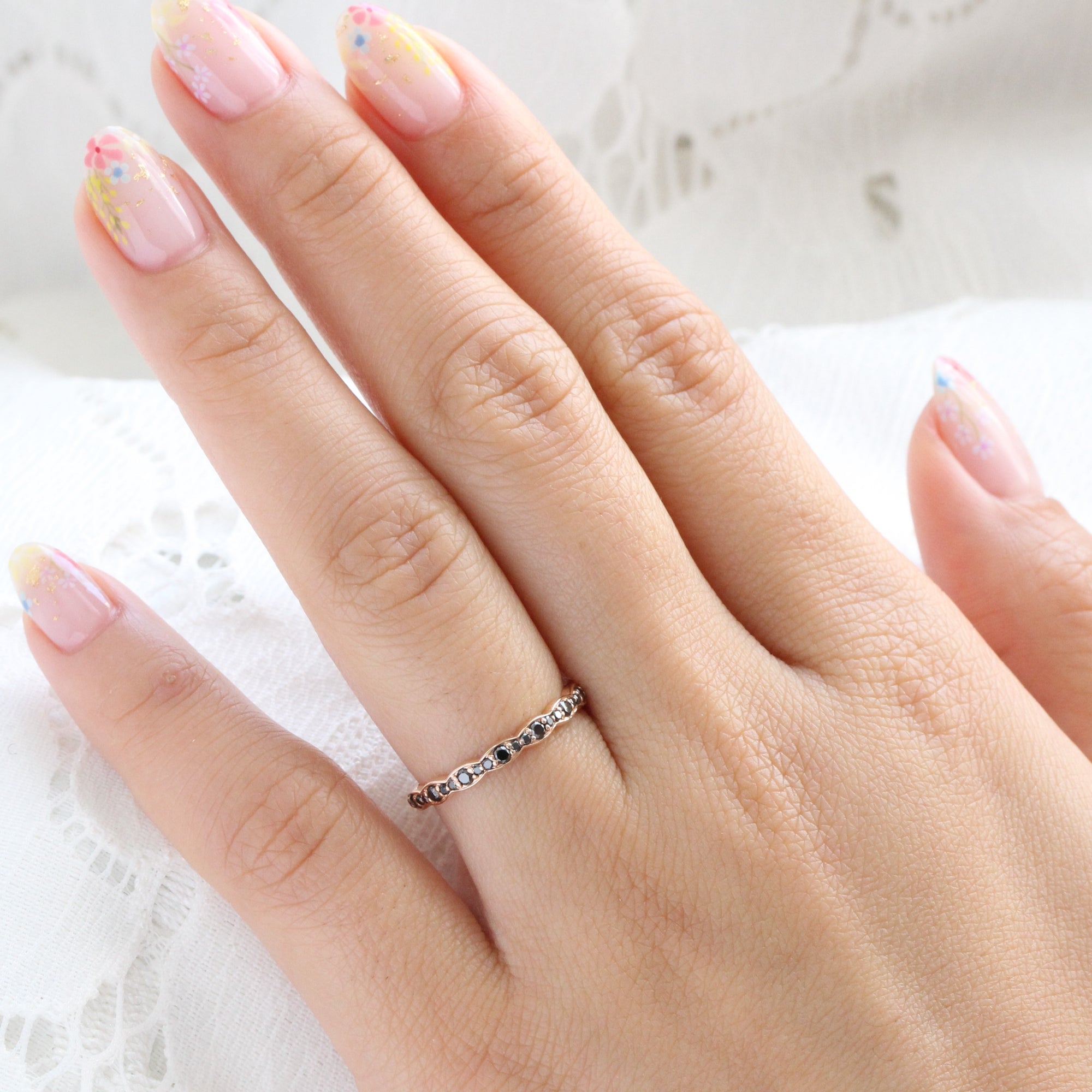 Black diamond wedding ring in rose gold scalloped band by la more design