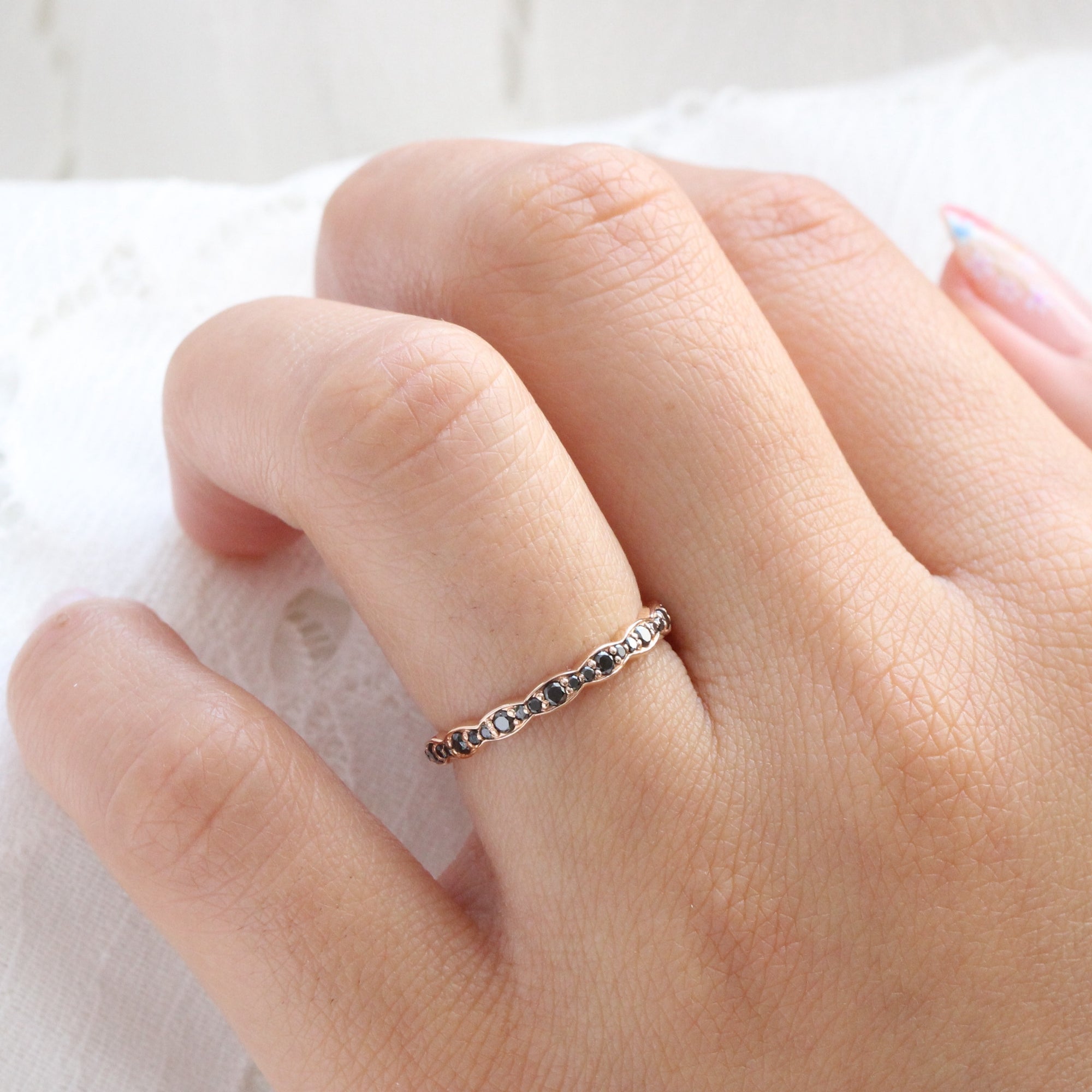 Black diamond wedding ring in rose gold scalloped band by la more design