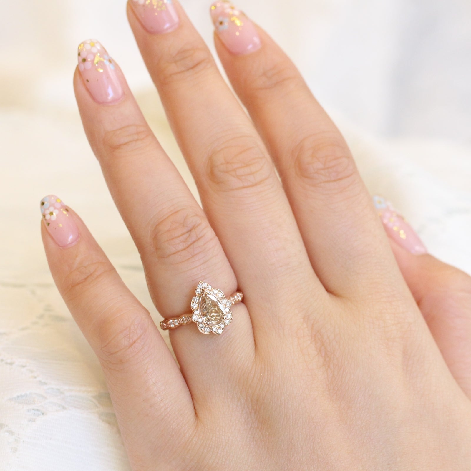 Pear shaped champagne diamond ring store