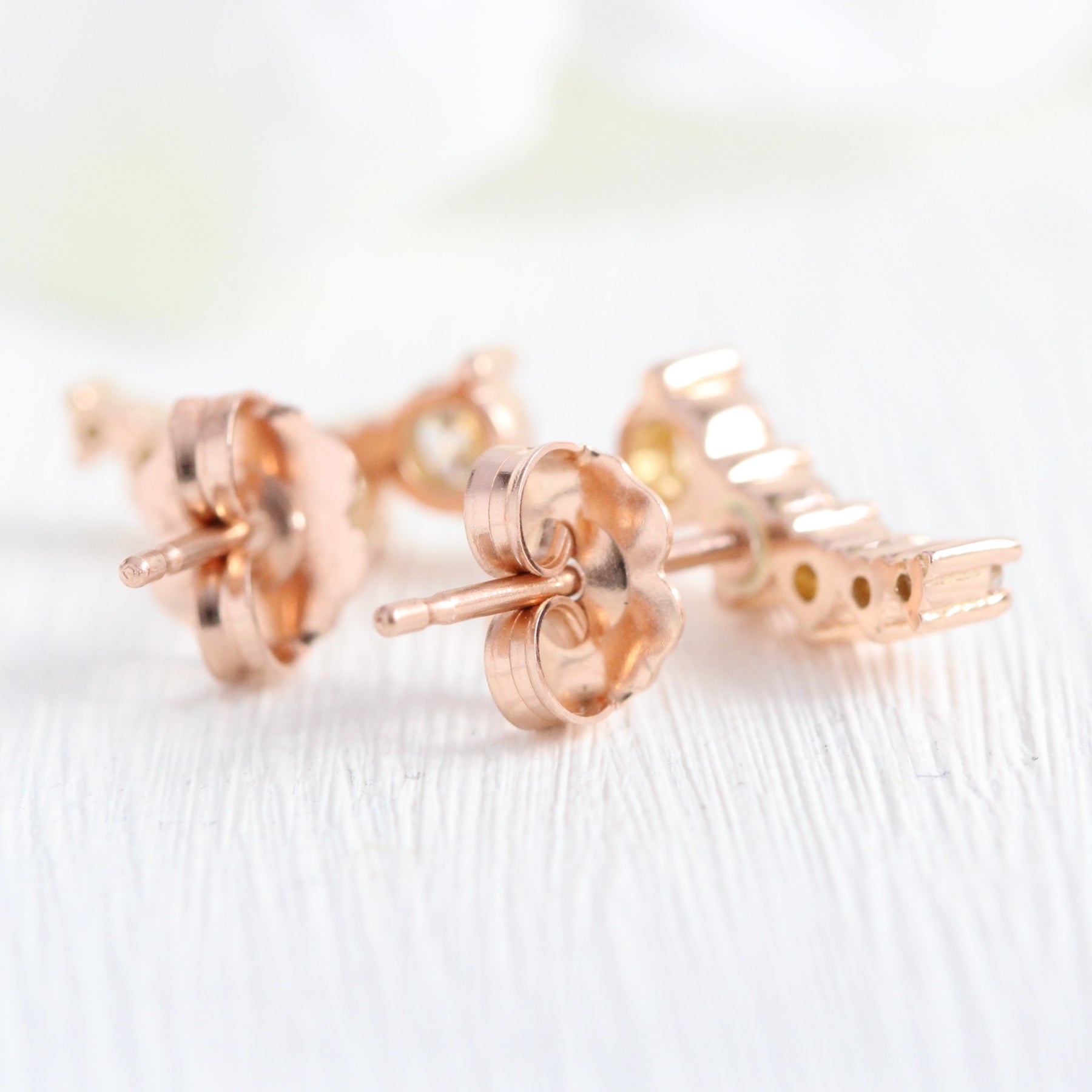 Curved 5 stone diamond earrings rose gold studs la more design jewelry