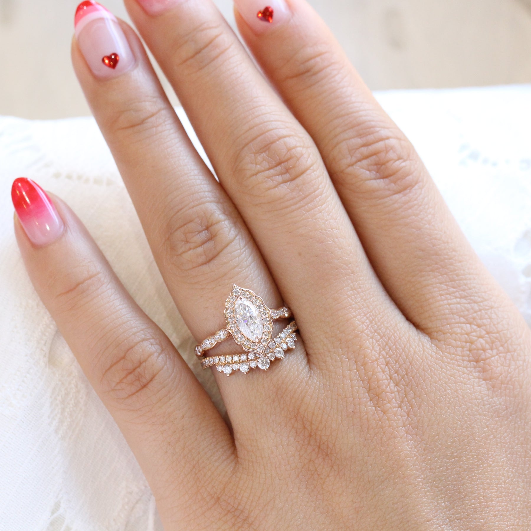 Halo diamond marquise ring rose gold curved crown diamond wedding ring bridal set by la more design jewelry