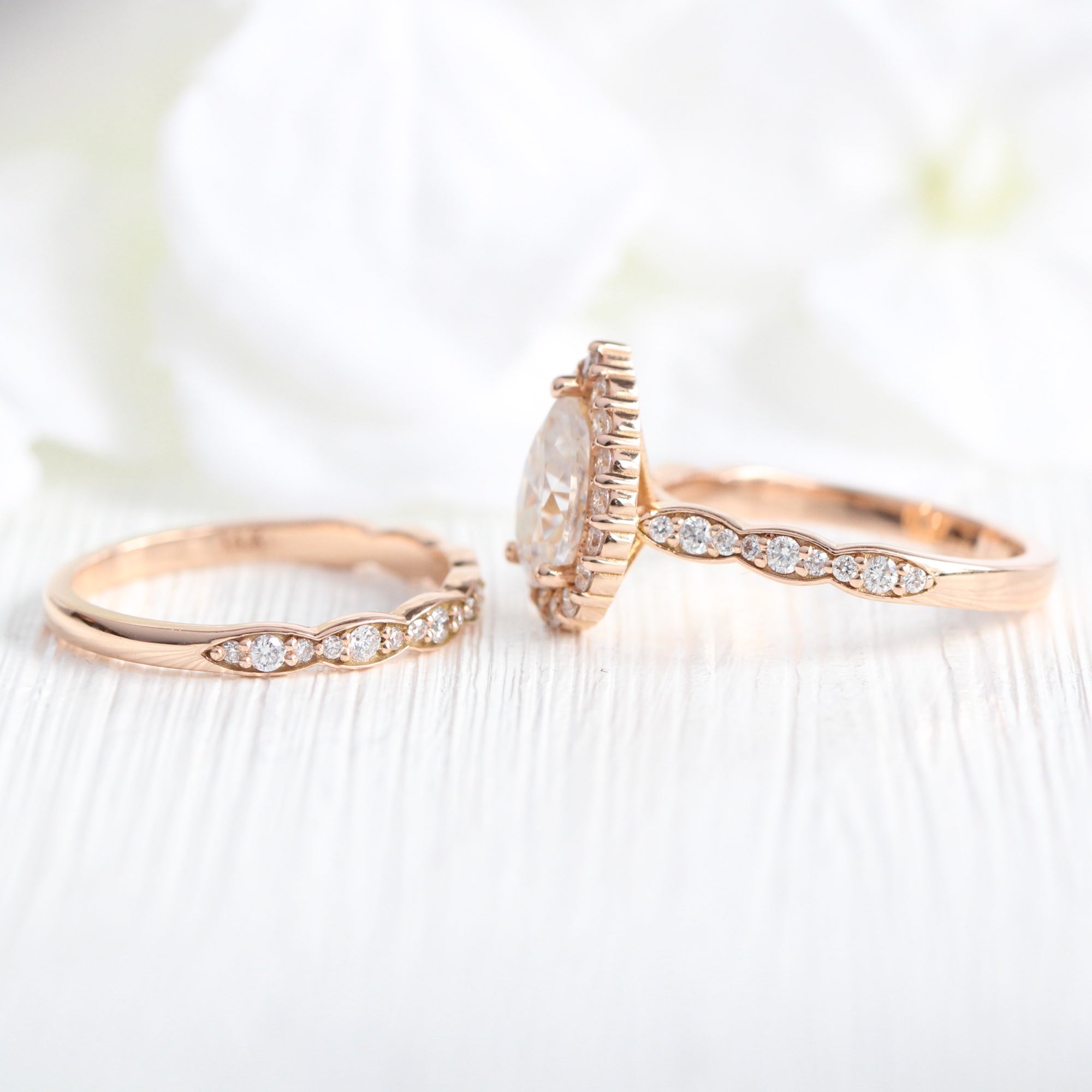 Halo diamond pear moissanite ring bridal set in rose gold scalloped band by la more design jewelry